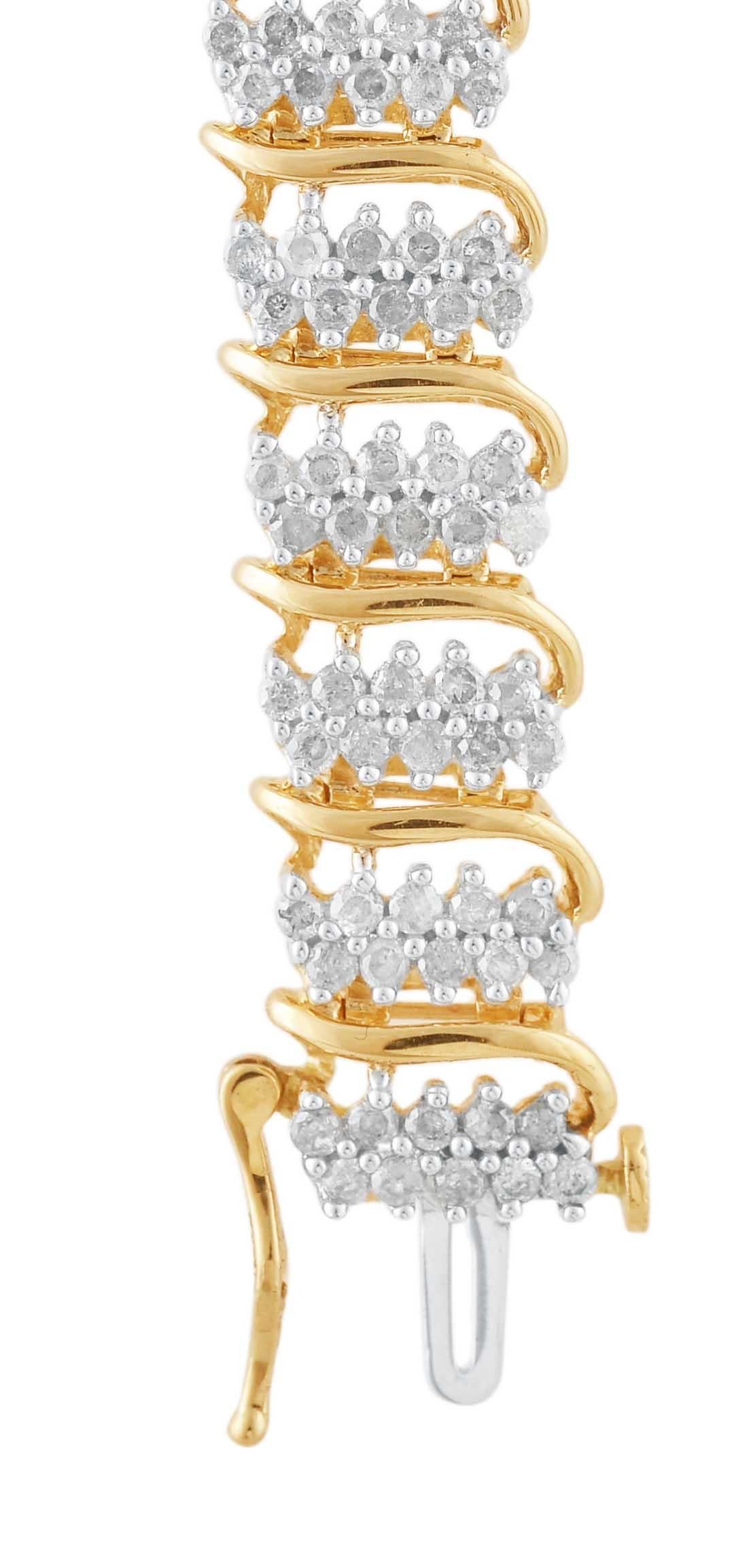 With a cascade of shimmer, this diamond bracelet draws all the right kind of attention. Crafted in 14 karat yellow gold, this gleaming look features 'S' shaped links and it features 270 round brilliant-cut diamond in prong setting. The total diamond