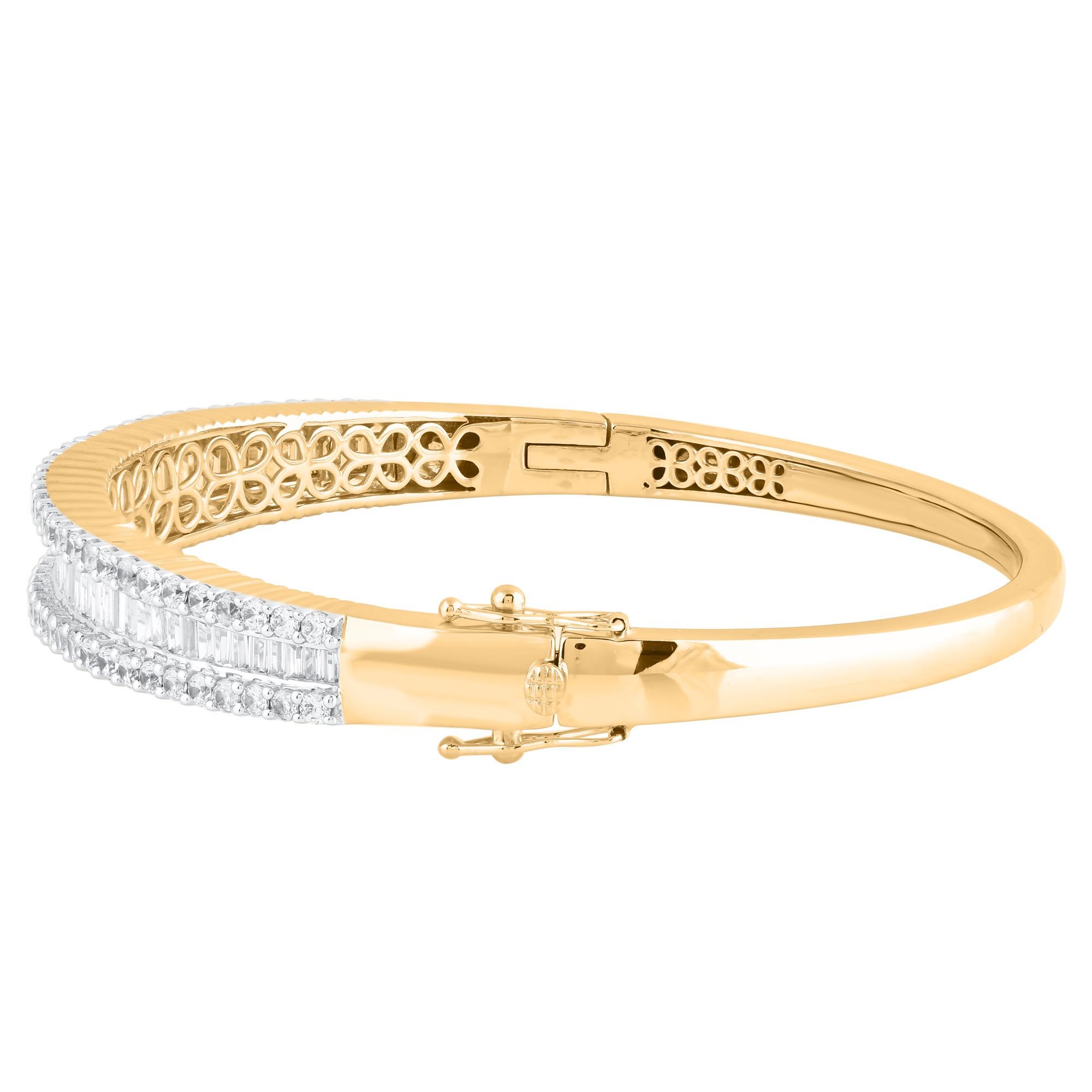Classic and sophisticated, this diamond bangle bracelet pairs well with any attire. This Shimmering bangle bracelet features 119 natural brilliant cut & baguette diamonds in prong & channel setting and crafted in 14kt yellow gold. Diamonds are