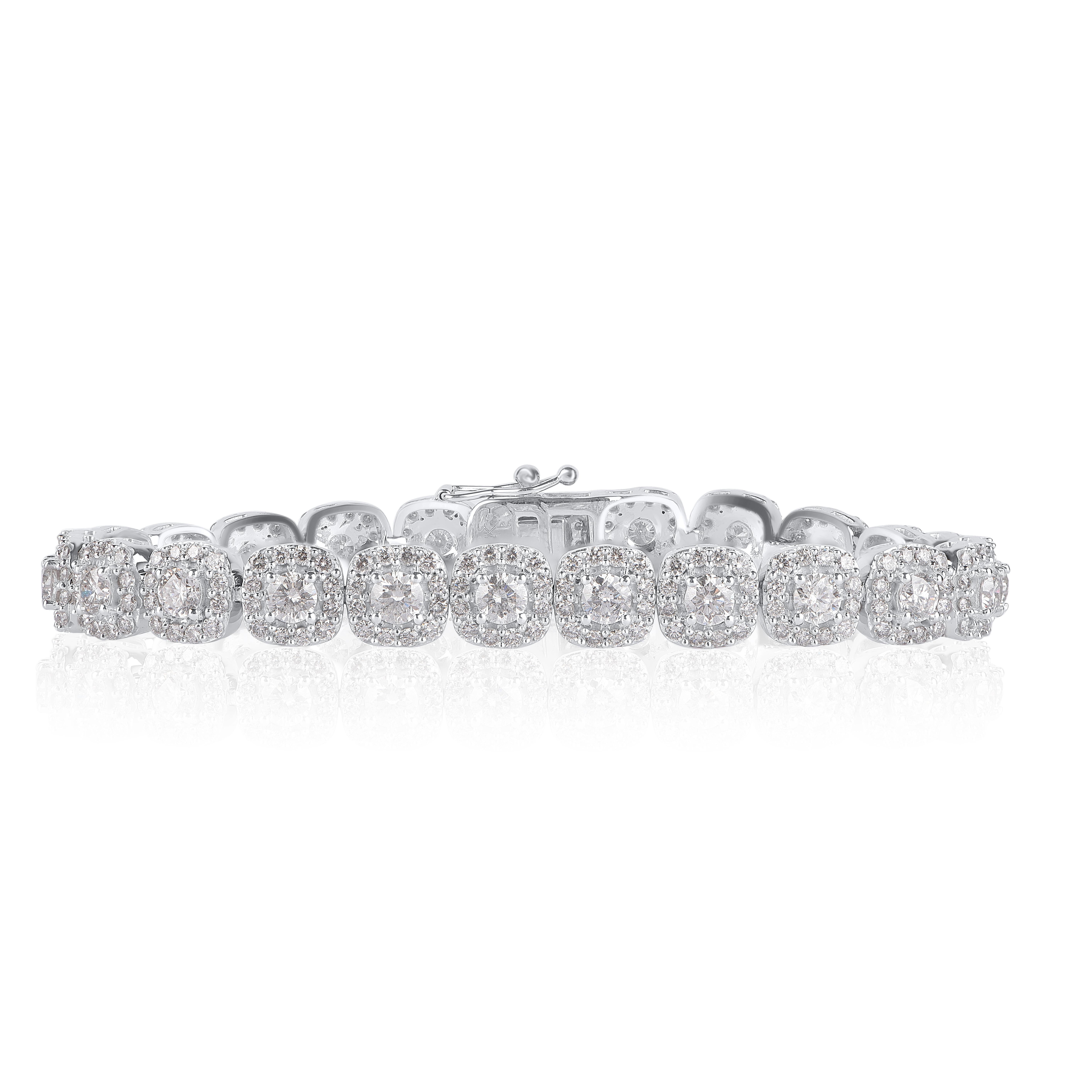 A exquisitely designed diamond bracelet studded with 312 round-cut diamonds in prong setting, diamonds are graded H-I Color, I1-I2 Clarity. The bracelet secures easily with box clasp.