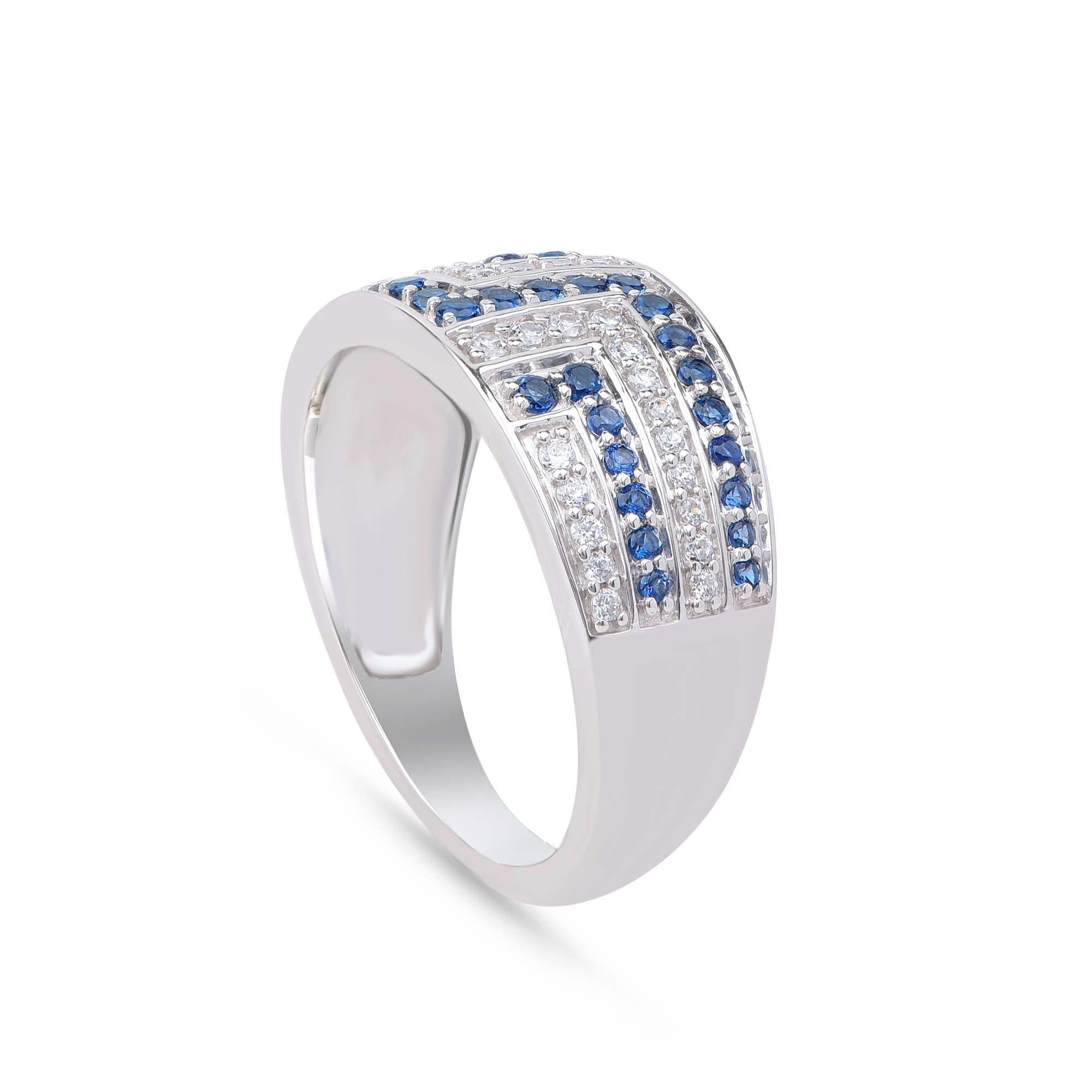 Embedded with 34 brilliant cut diamonds and 35 blue sapphire in pave setting and designed by experts in 18-karat white gold. Diamonds are graded H-I Color, I2 Clarity. 

Metal color and ring size can be customized on request. 

This piece is made to
