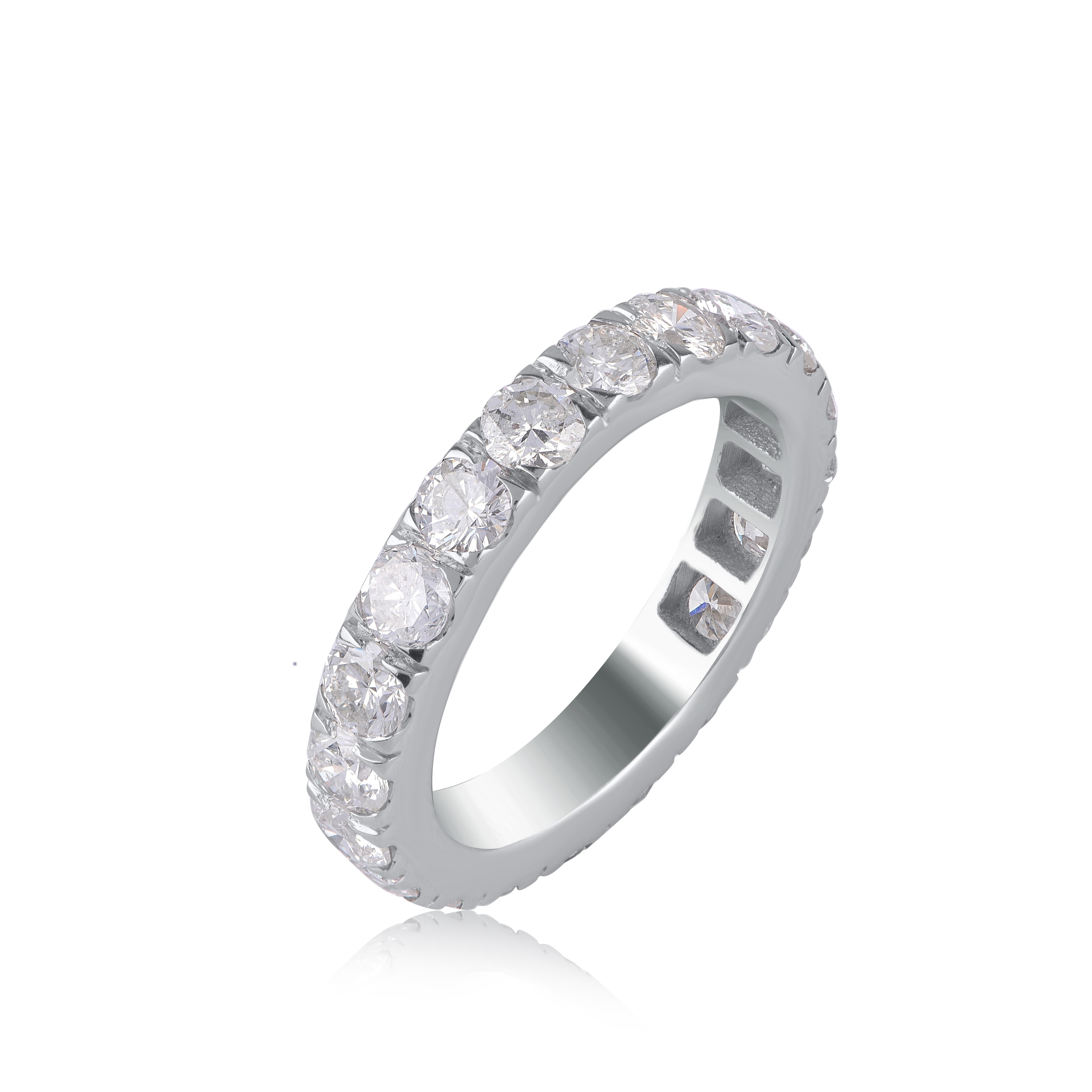 Add a touch of elegance to your look with this diamond studded full eternity band. Crafted in 14 KT white gold, this diamond band is studded with 20 round-cut diamonds in micro-pave setting, and diamonds are graded HI Color, I2 Clarity. It comes