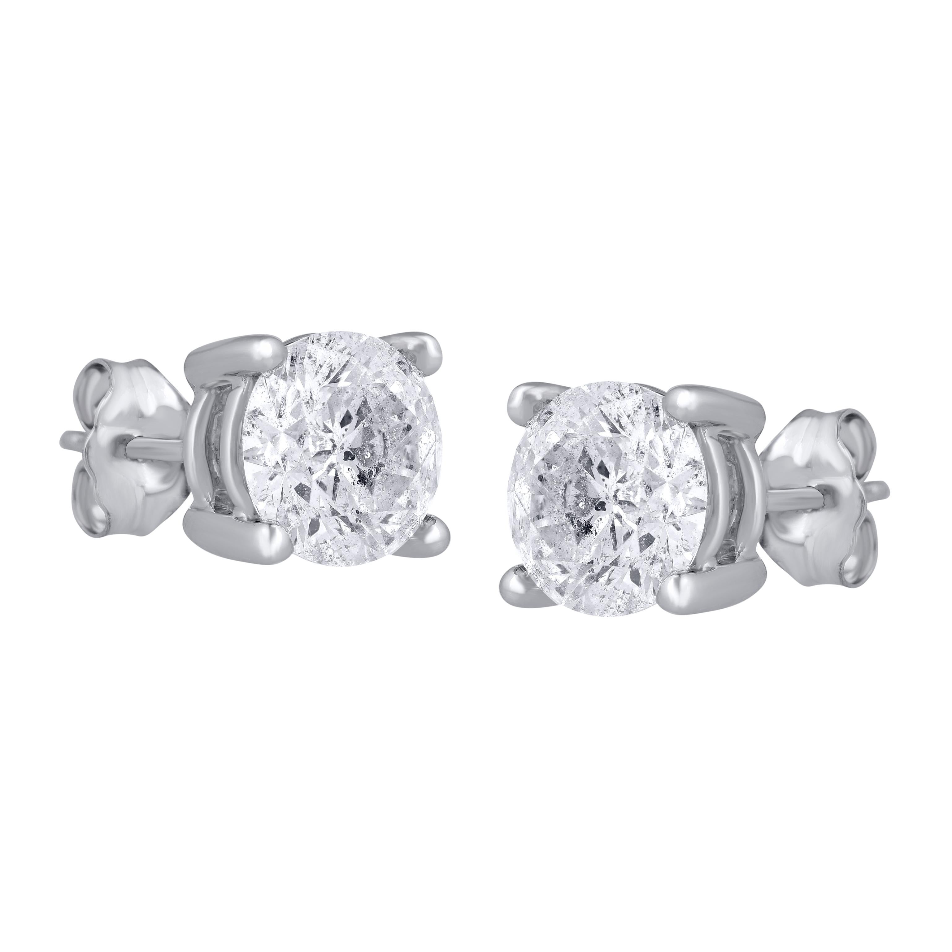 These classic solitaire stud earrings in prong setting are handcrafted in 18Kt white gold and the diamonds are graded HI Color, I2 Clarity. These Stud earrings are secure comfortably with friction back. 

These earrings will come along with an IGI