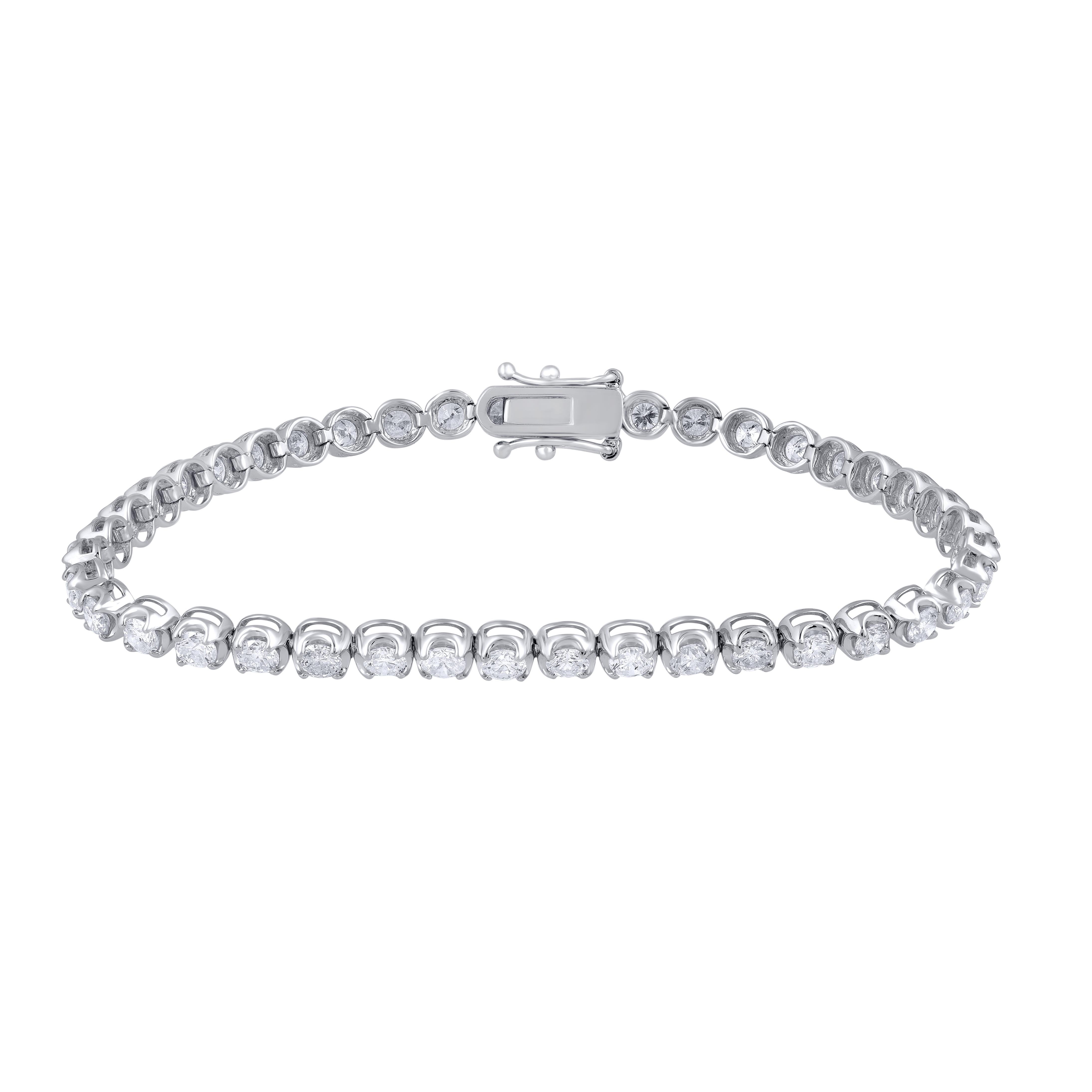 This stunning bracelet is perfect for everyday wear. It is studded with 41 diamonds in prong setting and crafted in 14 Kt  white gold. Diamond are graded G-H Color, I1- I2 Clarity. Bracelet secures firmly with a box clasp and it will be accompanied