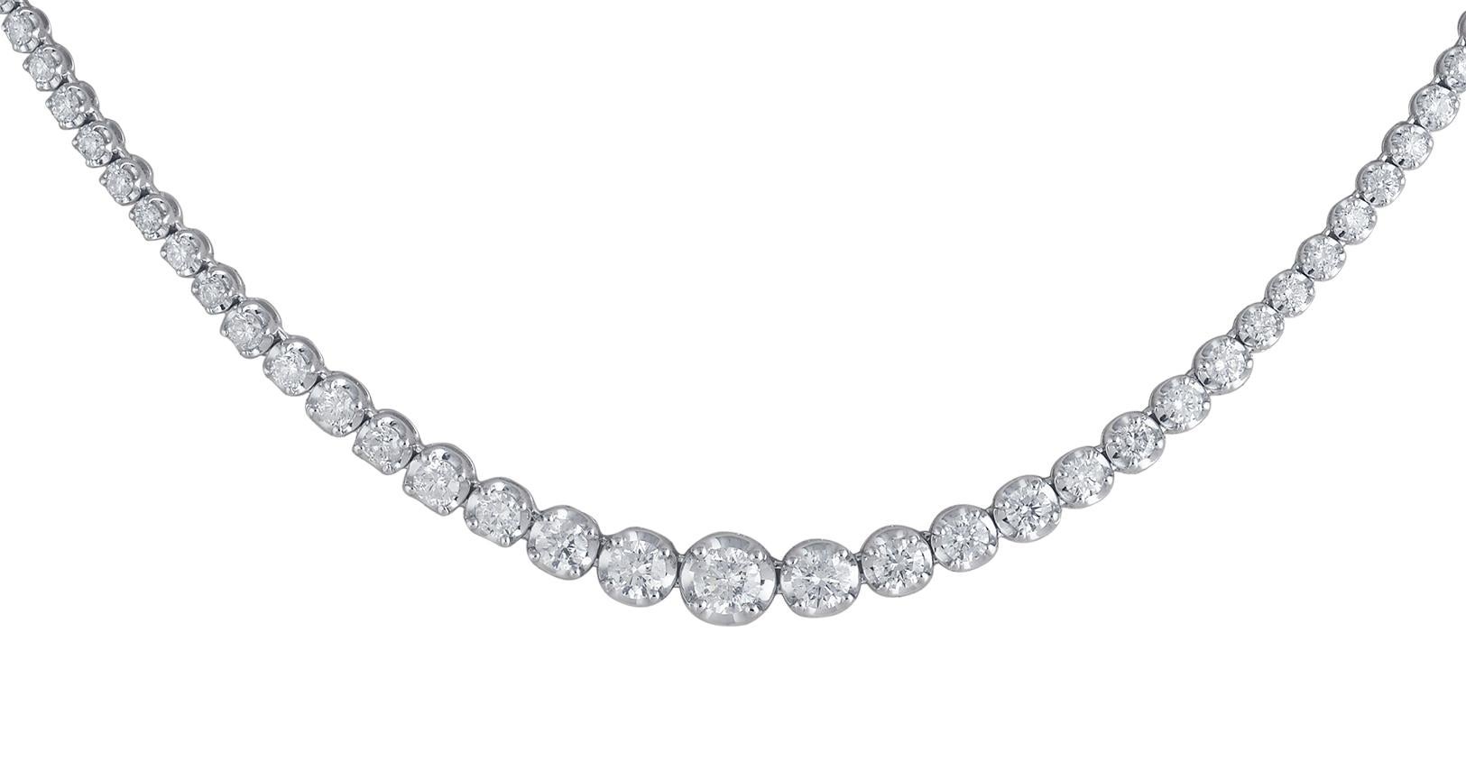 A classic necklace design, this tennis necklace is studded with 107 diamonds in prong setting, crafted beautifully in 14kt Gold. The diamonds are graded H-I Color, I1-I2 Clarity. The Push button clasp provides security that blends seamlessly into