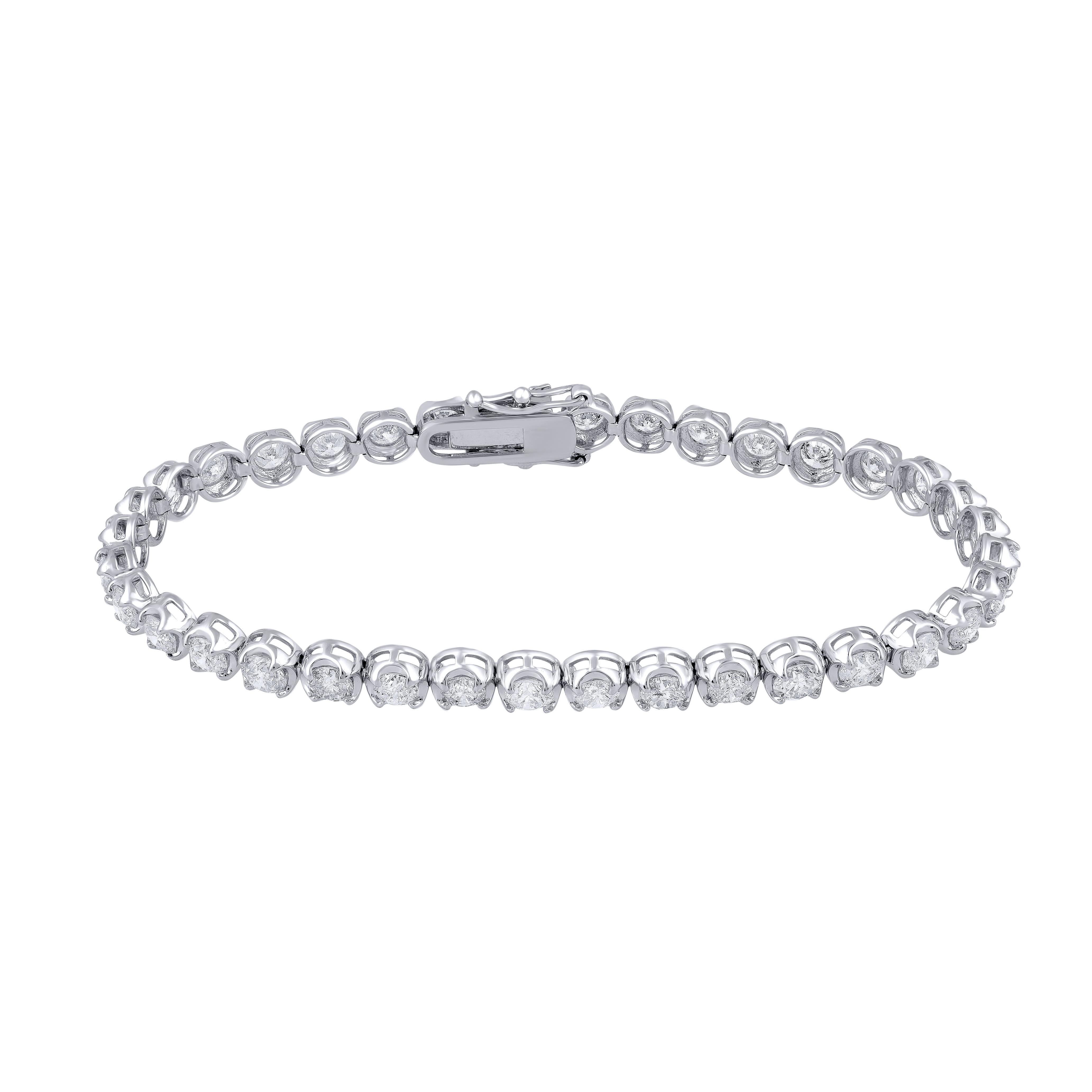 Add a shimmering touch to your look with this brilliant bracelet. Set with 36 diamonds in prong setting, it is crafted in 14 KT gold, diamond details GH Color, I1-I2 Clarity. The bracelet comes along with a IGI certificate of authentication.