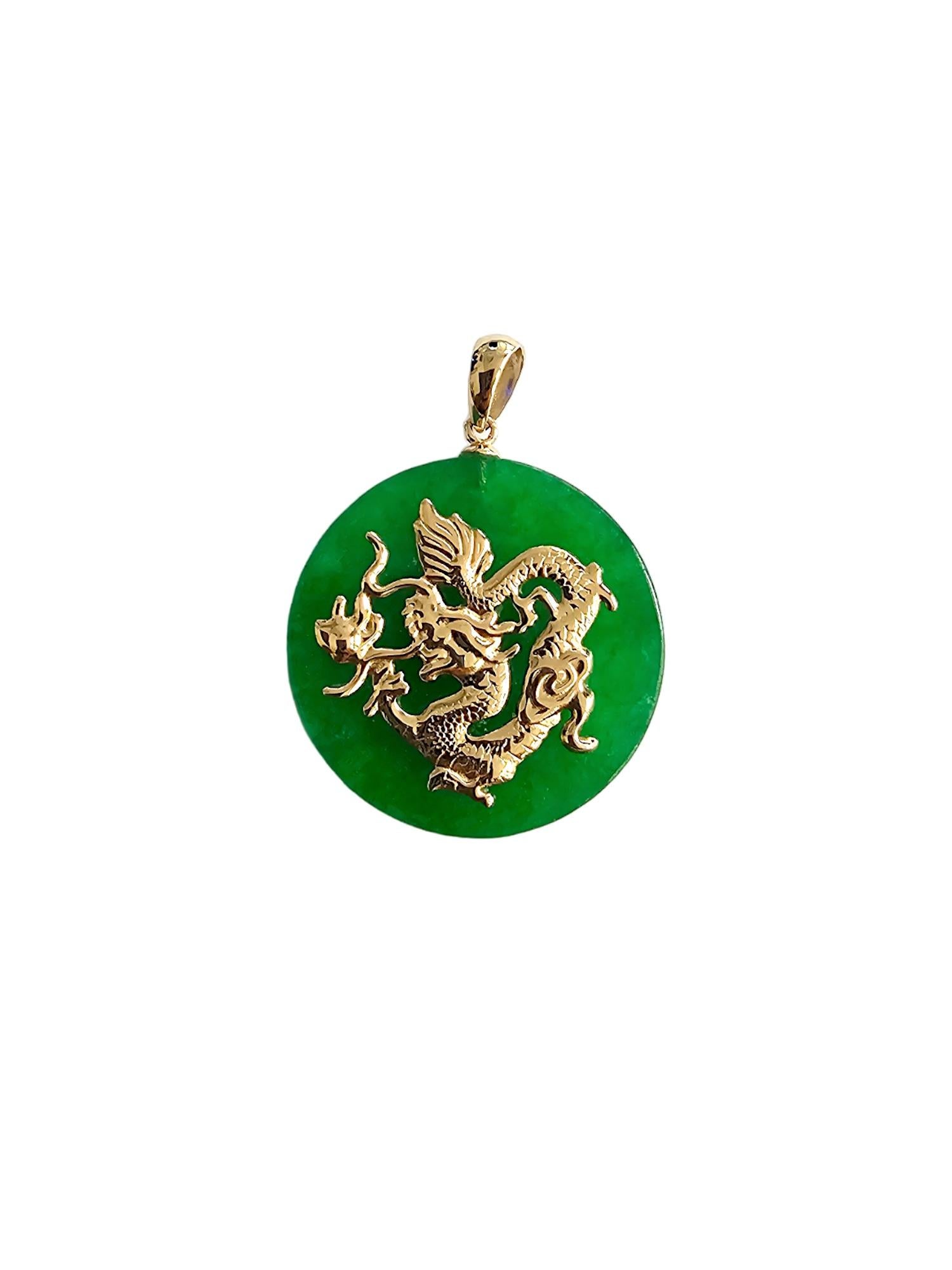 TKO Green Jade Dragon Pendant (with 14K Yellow Gold) 25mm Disc

Using our signature dragon design, we create a bold statement with a 14K Yellow Gold Dragon imposed on a green Jadeite disc. We use the bold green hues and contrast them with Yellow