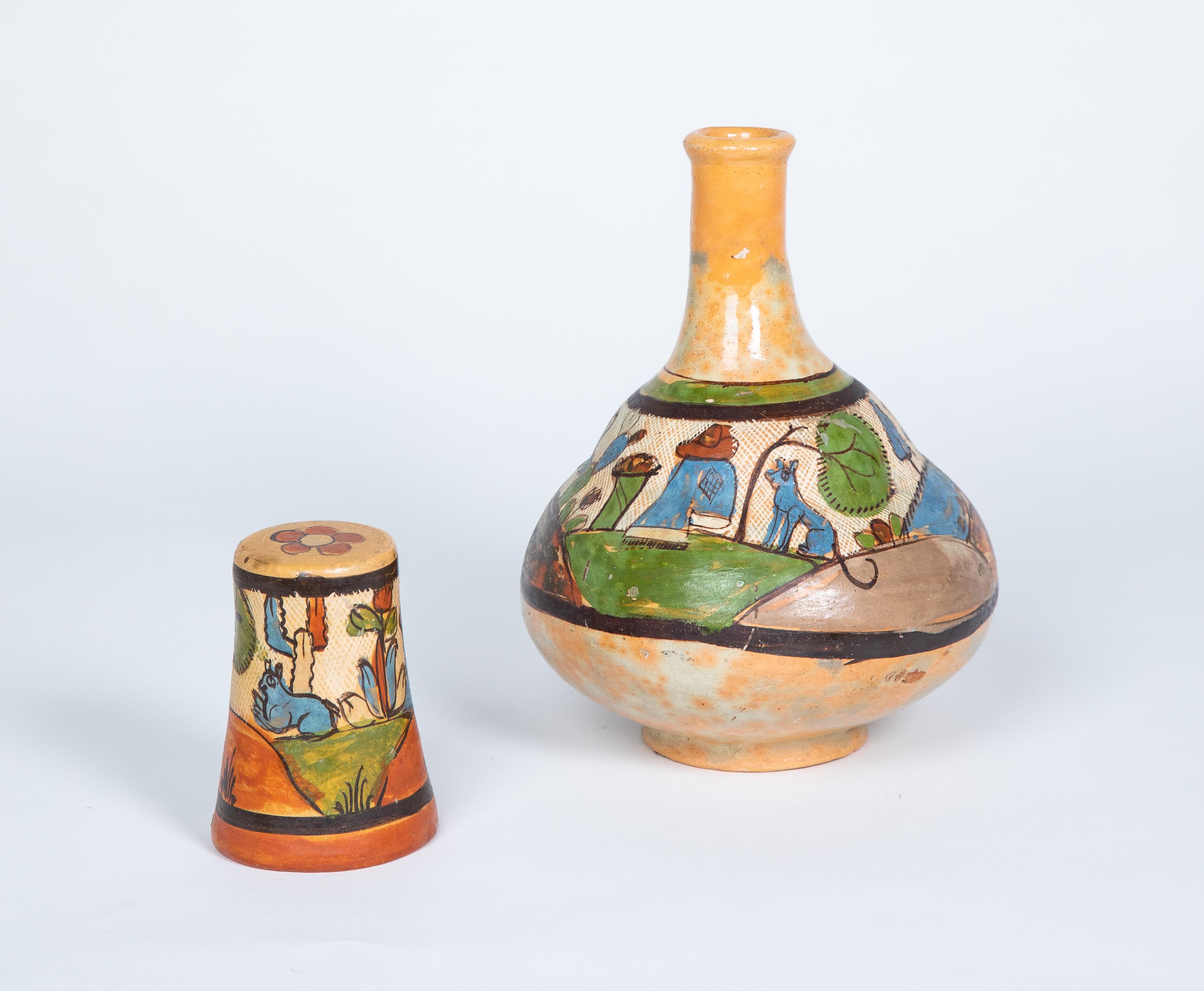 mexican water jug with cup