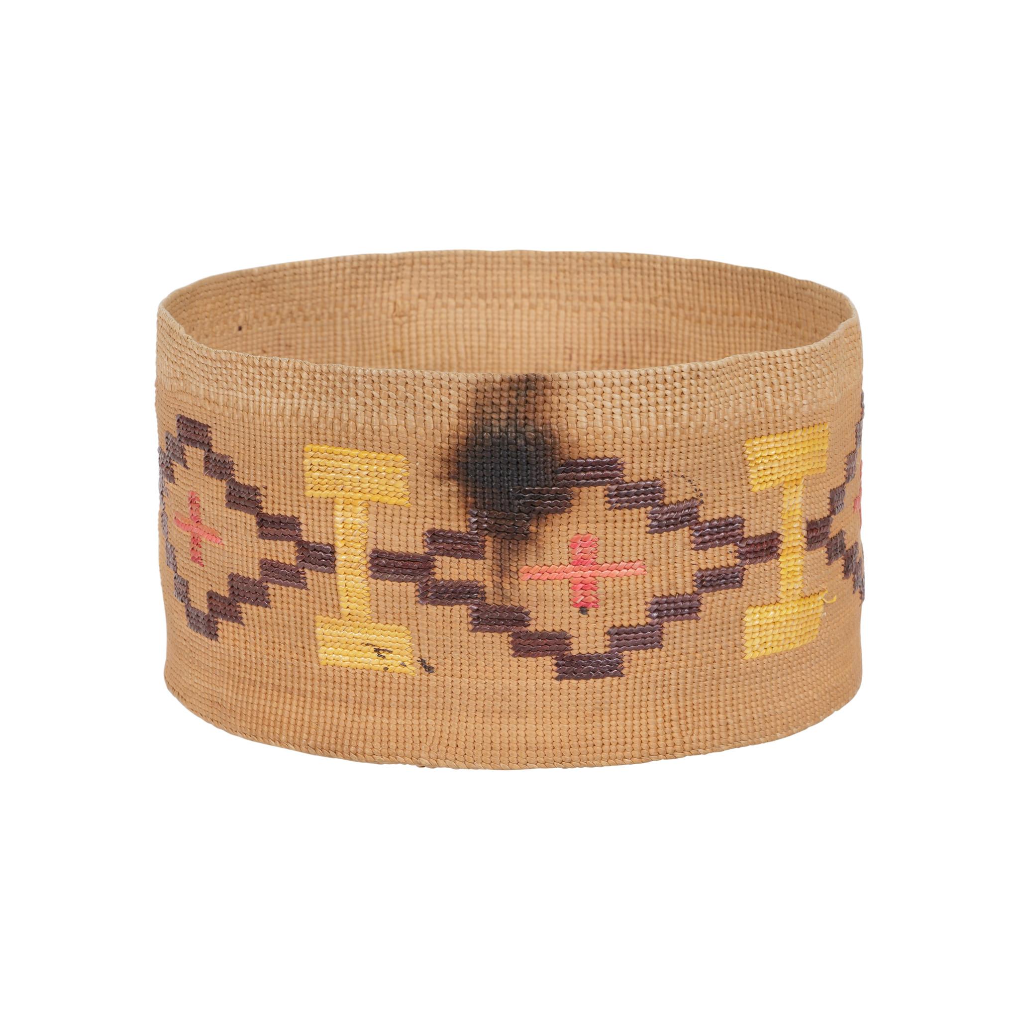 Bright colored Tlingit lidded rattle top basket. Exceptional condition. One small stain not distracting.

Period: Last quarter of the 19th century

Origin: Alaska

Size: 3 1/2