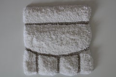 Alfombra blanca tejida a mano To Be, colección Take Me Up de Paolo Stella