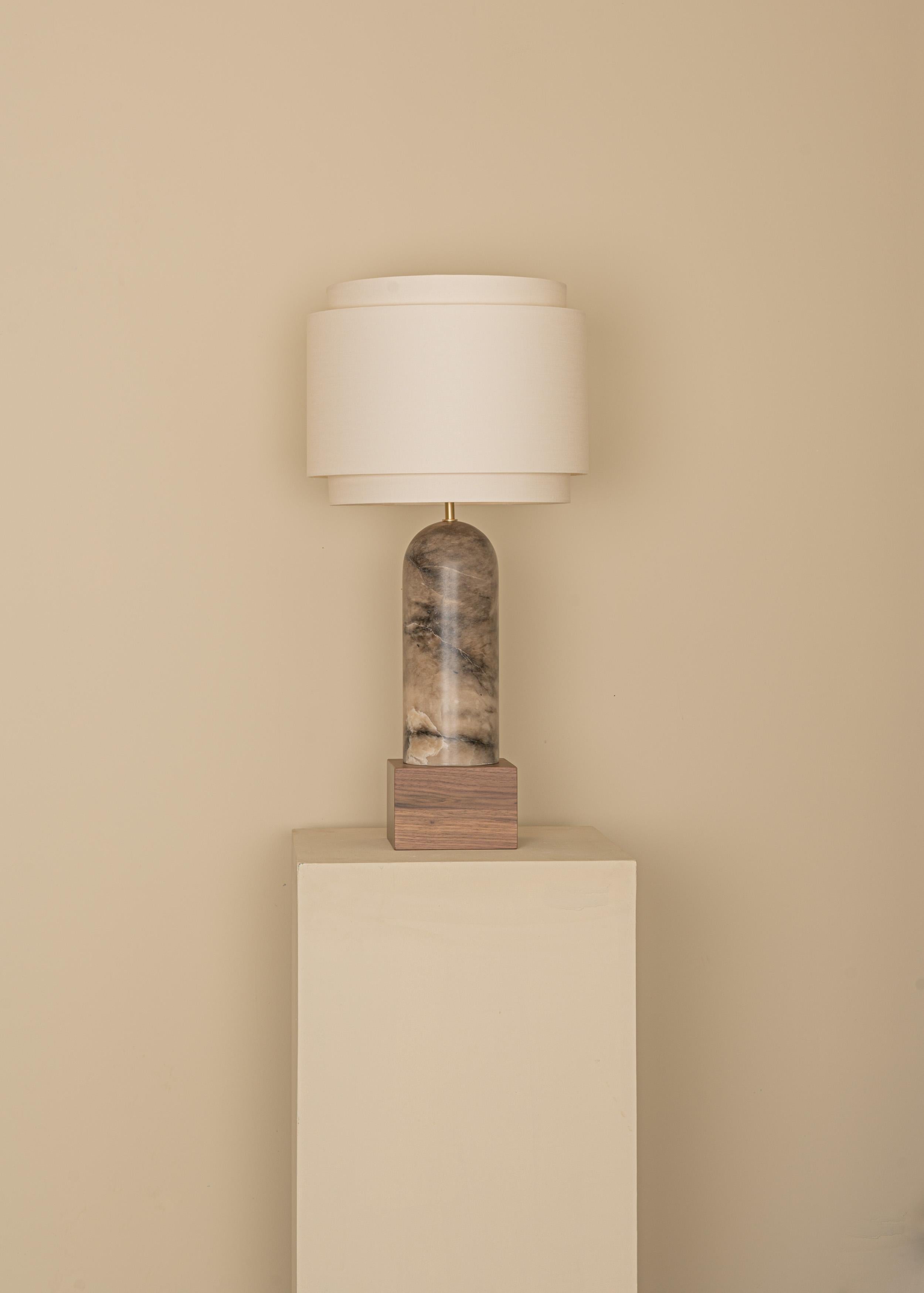Tobacco Alabaster And Walnut Base Pura Kelo Double Table Lamp by Simone & Marcel
Dimensions: D 35 x W 35 x H 69 cm.
Materials: Brass, cotton, walnut and tobacco alabaster.

Also available in different marble, wood and alabaster options and finishes.