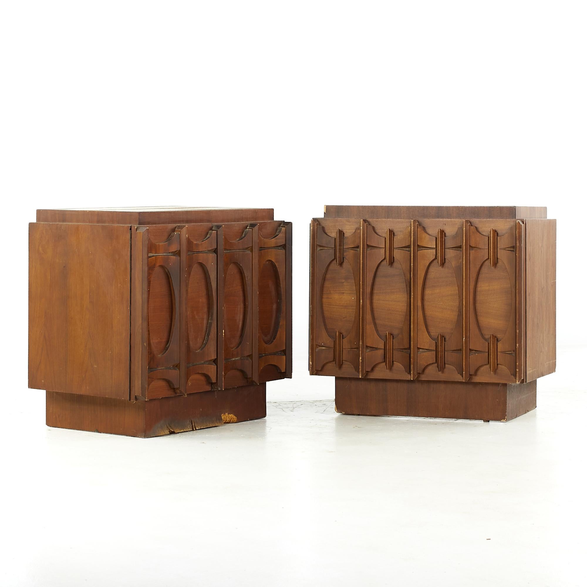 Tobago Brutalist midcentury walnut nightstands, pair.

Each nightstand measures: 26 wide x 18 deep x 24.75 inches high.

All pieces of furniture can be had in what we call restored vintage condition. That means the piece is restored upon
