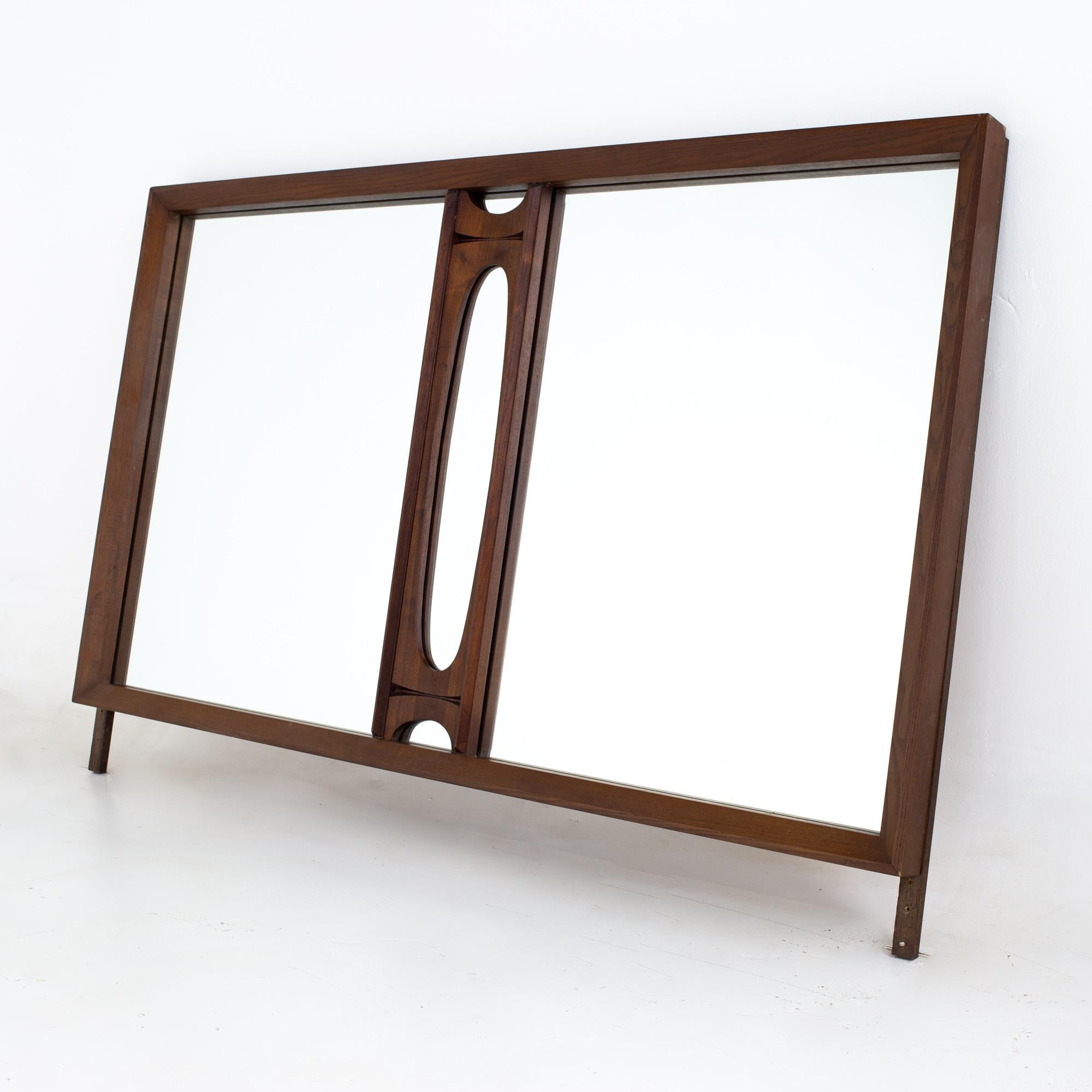 Tobago Canadian Brutalist Mid Century Walnut Mirror

Mirror measures: 63 wide x 3.5 deep x 38 inches high 

All pieces of furniture can be had in what we call restored vintage condition. That means the piece is restored upon purchase so it’s free of
