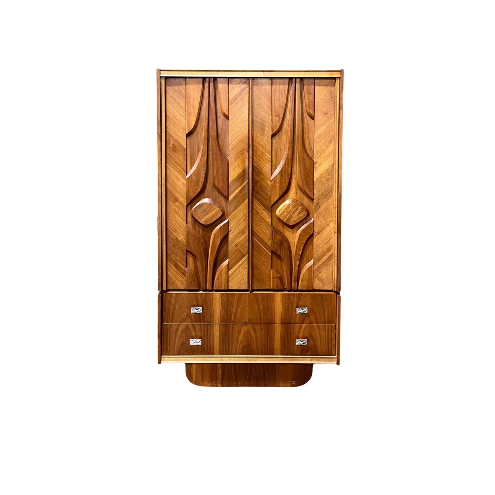 Tobago Furniture vintage brutalist mid century modern 4 drawer, 5 shelf armoire from the 1970s. This two-piece armoire by Tabago of Canada is a substantial piece of quality construction inspired by designers such as Paul Evan, Phillip Lloyd Powell,