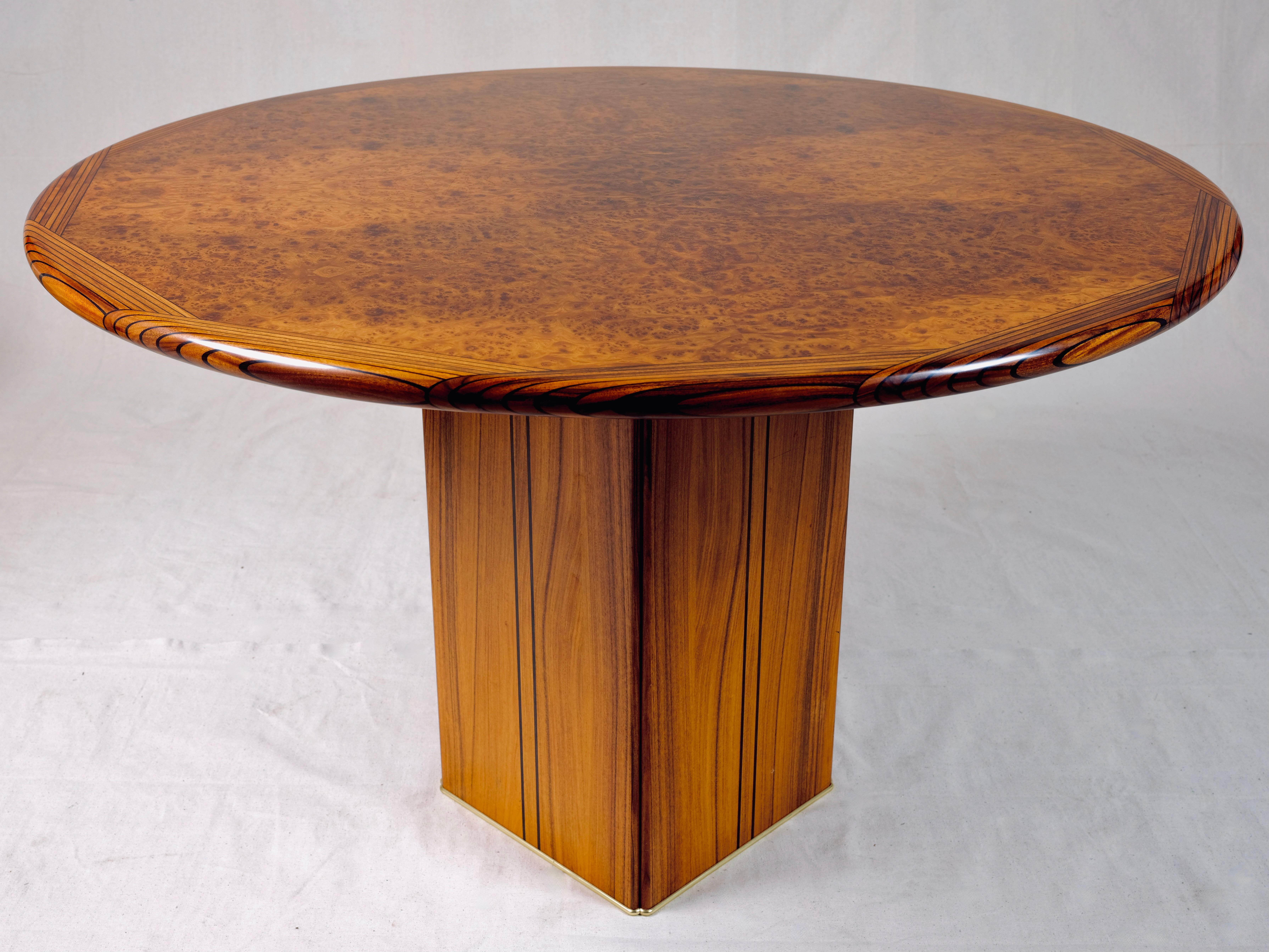 The ‘Africa’ or 'Artona' table was designed by Tobia & Afra Scarpa in the 1975.

This table is of historical significance, being a part of the very first design series to come from Max Alto in 1975.

Italian burl walnut top with ebonized inlay