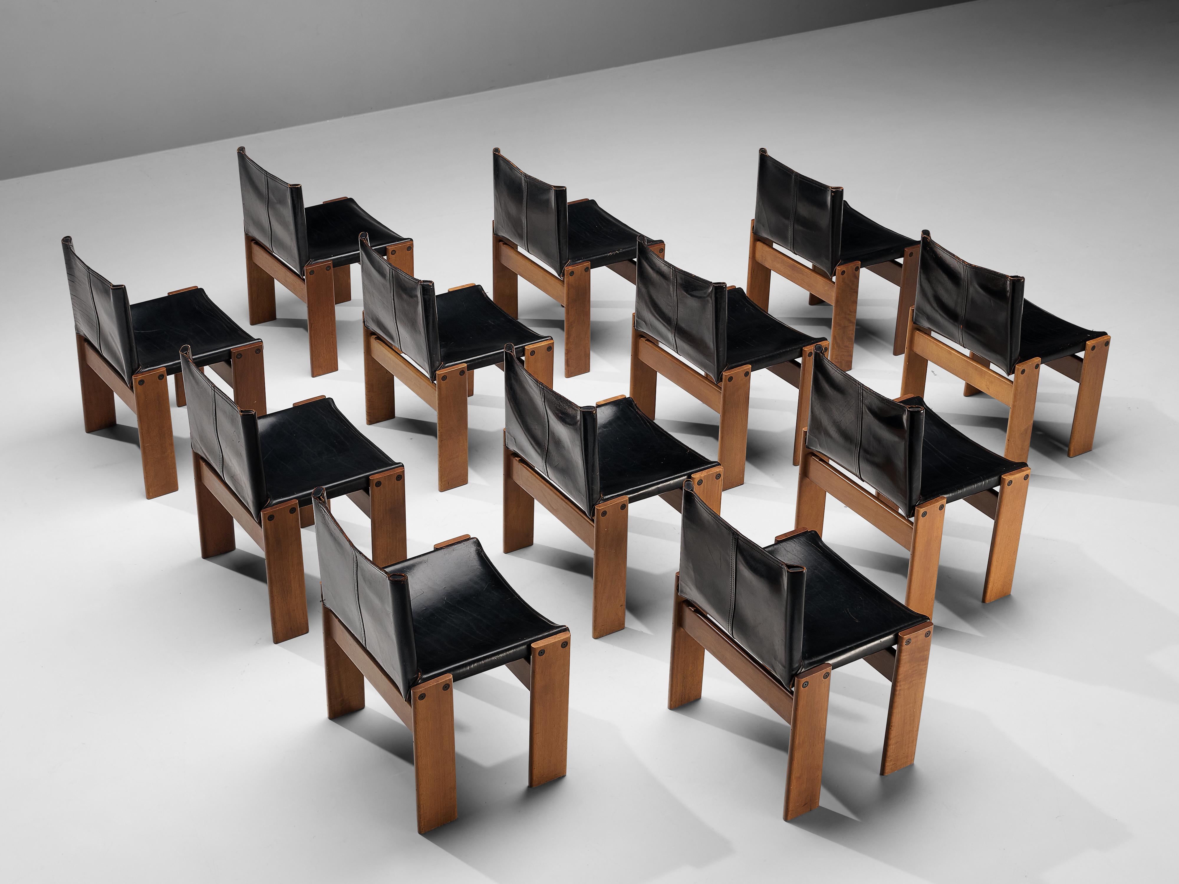 Afra & Tobia Scarpa for Molteni, dining chairs model 'Monk', beech, black leather, Italy, designed in 1974 

'Monk' dinign chairs by Italian designers Afra & Tobia Scarpa. The black leather forms a striking combination with the wood. Interesting