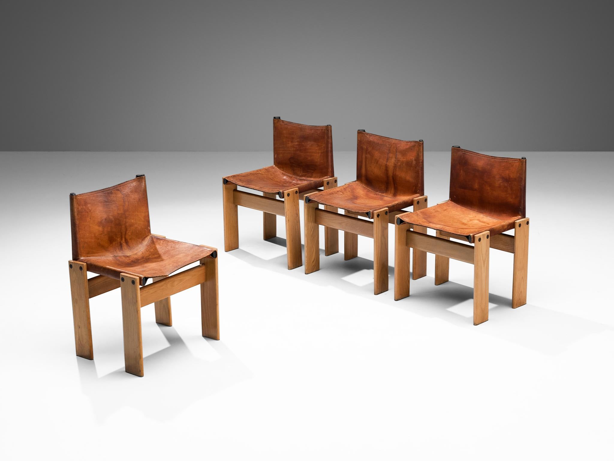 Afra & Tobia Scarpa for Molteni, set of four 'Monk' dining chairs, ash, cognac leather, Italy, 1974.

Set of four 'Monk' chairs by Italian designers Afra & Tobia Scarpa. The deep cognac leather shows beautiful patina and forms a striking combination