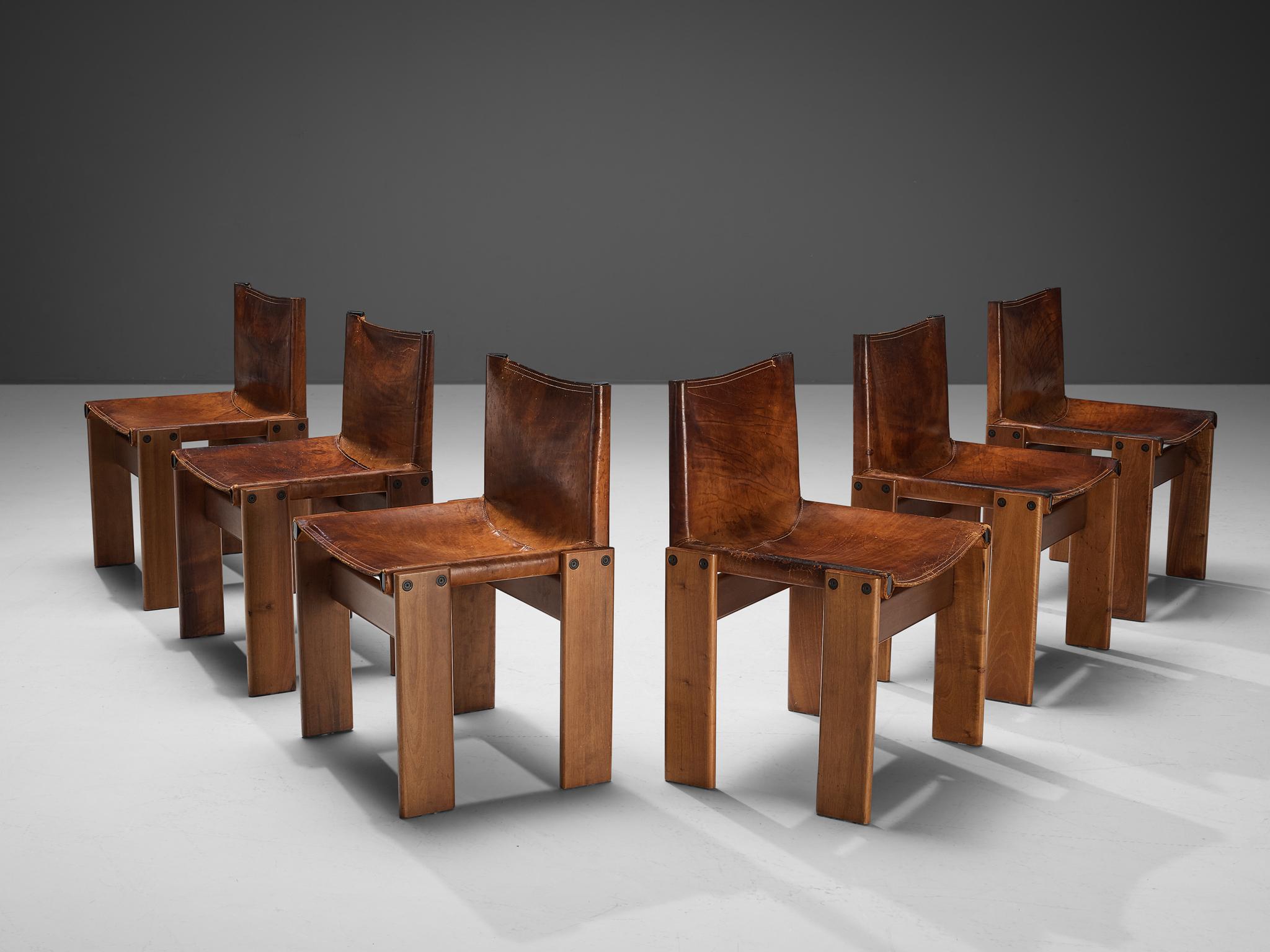 Afra & Tobia Scarpa for Molteni, 'Monk' dining chairs, walnut, cognac leather, Italy, 1974.

Set of six 'Monk' chairs by Italian designers Afra & Tobia Scarpa. The deep cognac leather shows beautiful patina and forms a striking combination with