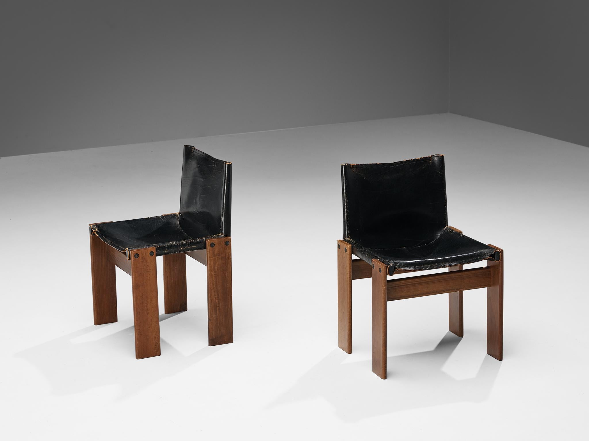 Afra & Tobia Scarpa for Molteni, set of six 'Monk' dining chairs, walnut, black leather, Italy, 1974.

Set of six 'Monk' chairs by Italian designers Afra & Tobia Scarpa. The black leather shows beautiful patina and forms a striking combination