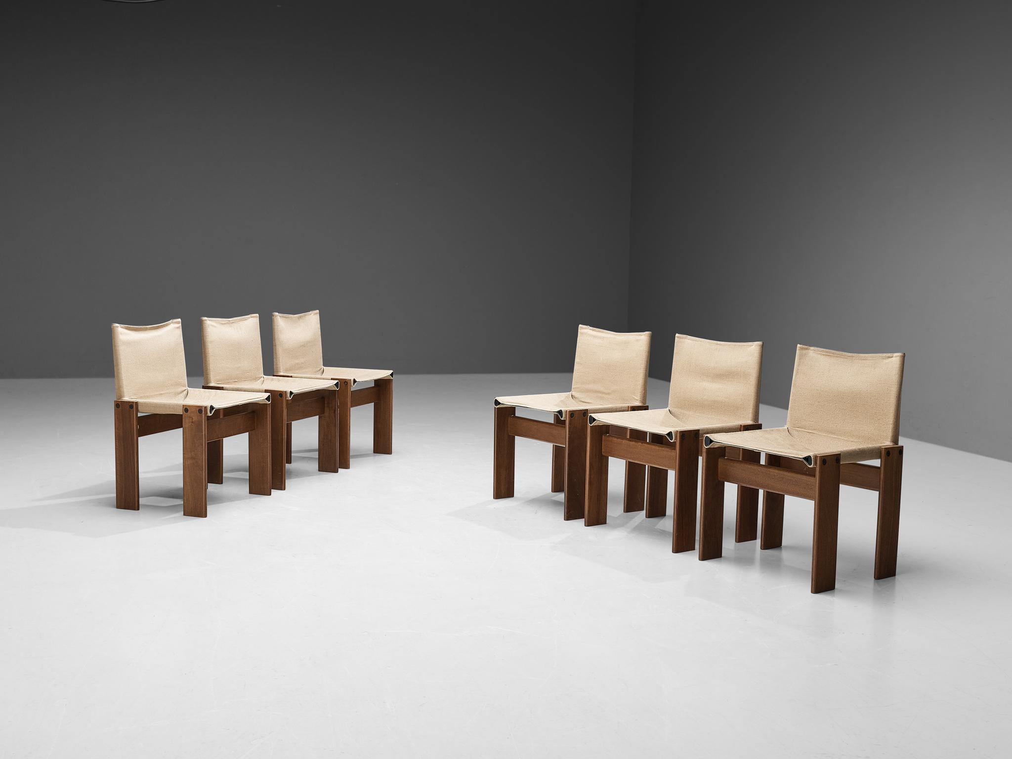 Afra & Tobia Scarpa for Molteni, set of six 'Monk' dining chairs, walnut, canvas, Italy, 1974.

The off-white canvas forms a striking combination with the walnut wood. Interesting is the 'flat' shape of this chair where the designer has chosen to