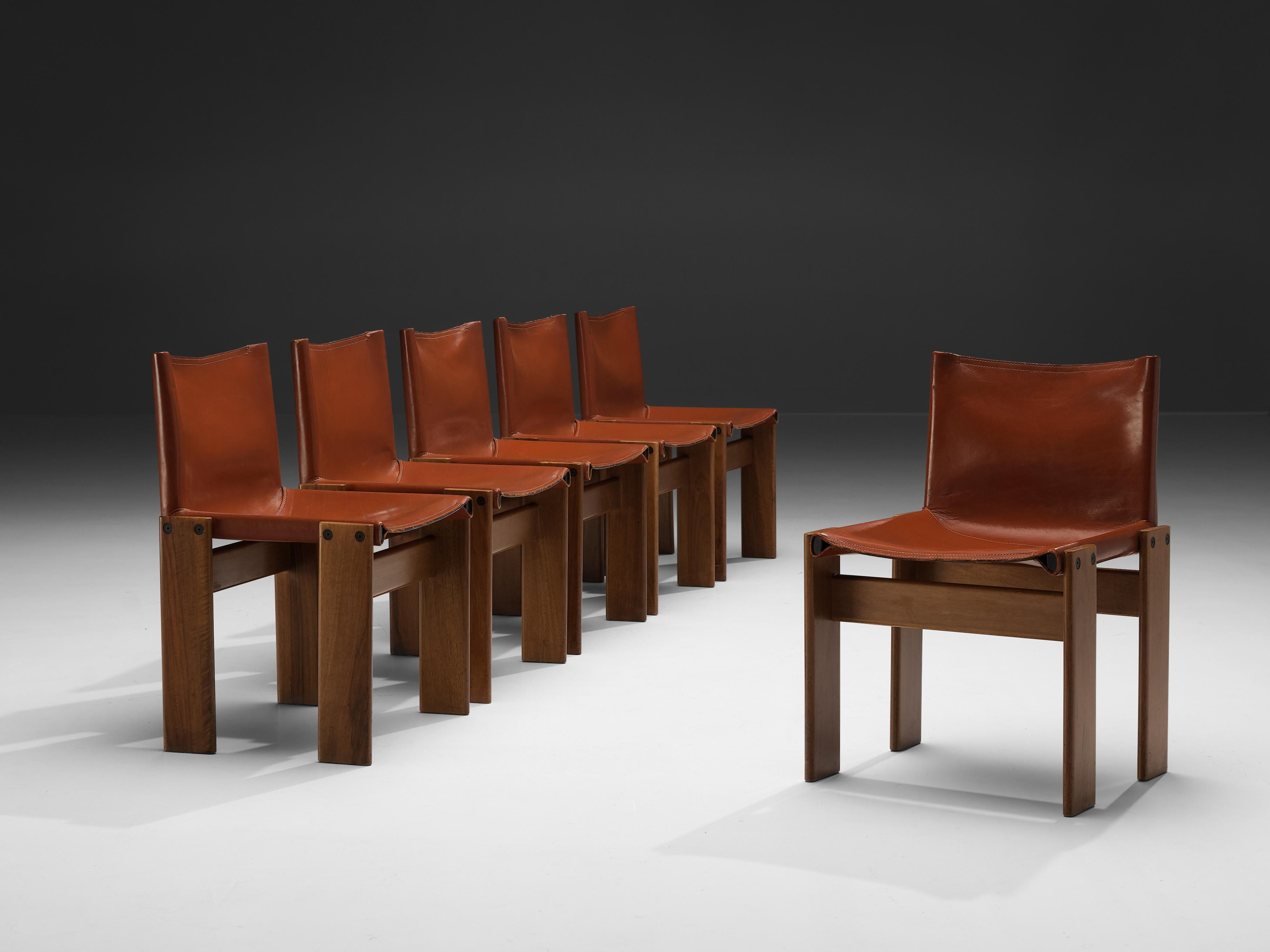 Afra & Tobia Scarpa for Molteni, set of six 'Monk' dining chairs, walnut, red leather, Italy, 1974

Afra & Tobia Scarpa designed the 'Monk' chairs for Molteni in 1974. The red leather forms a striking combination with the beautifully grained