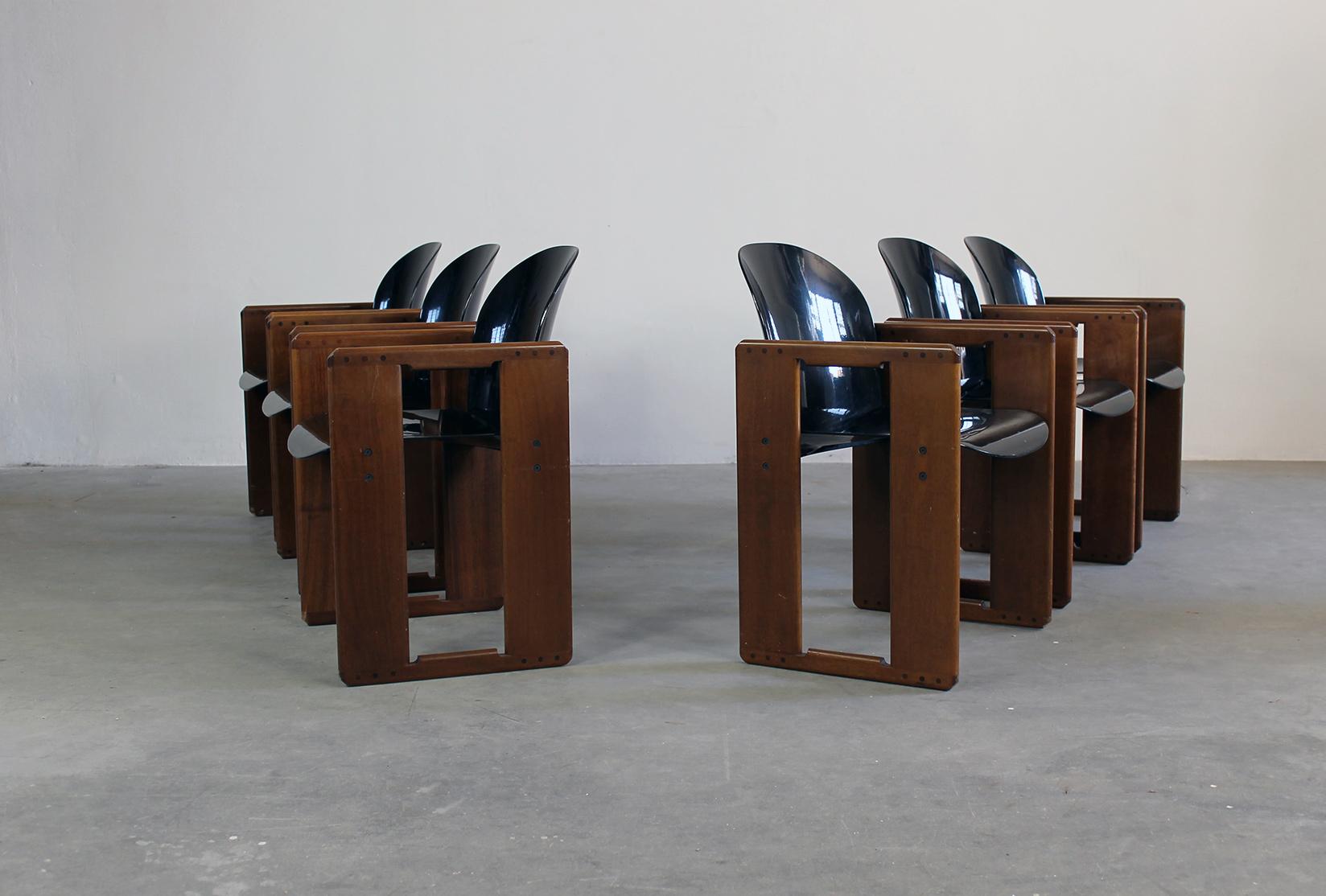 Set of six Dialogo chairs with structure in wood, seat and back in black fiberglass and metal details. 
Designed by Tobia & Afra Scarpa and produced by B&B Italia in 1973. 

The Dialogo chair present a peculiar geometric frame in wood to which the