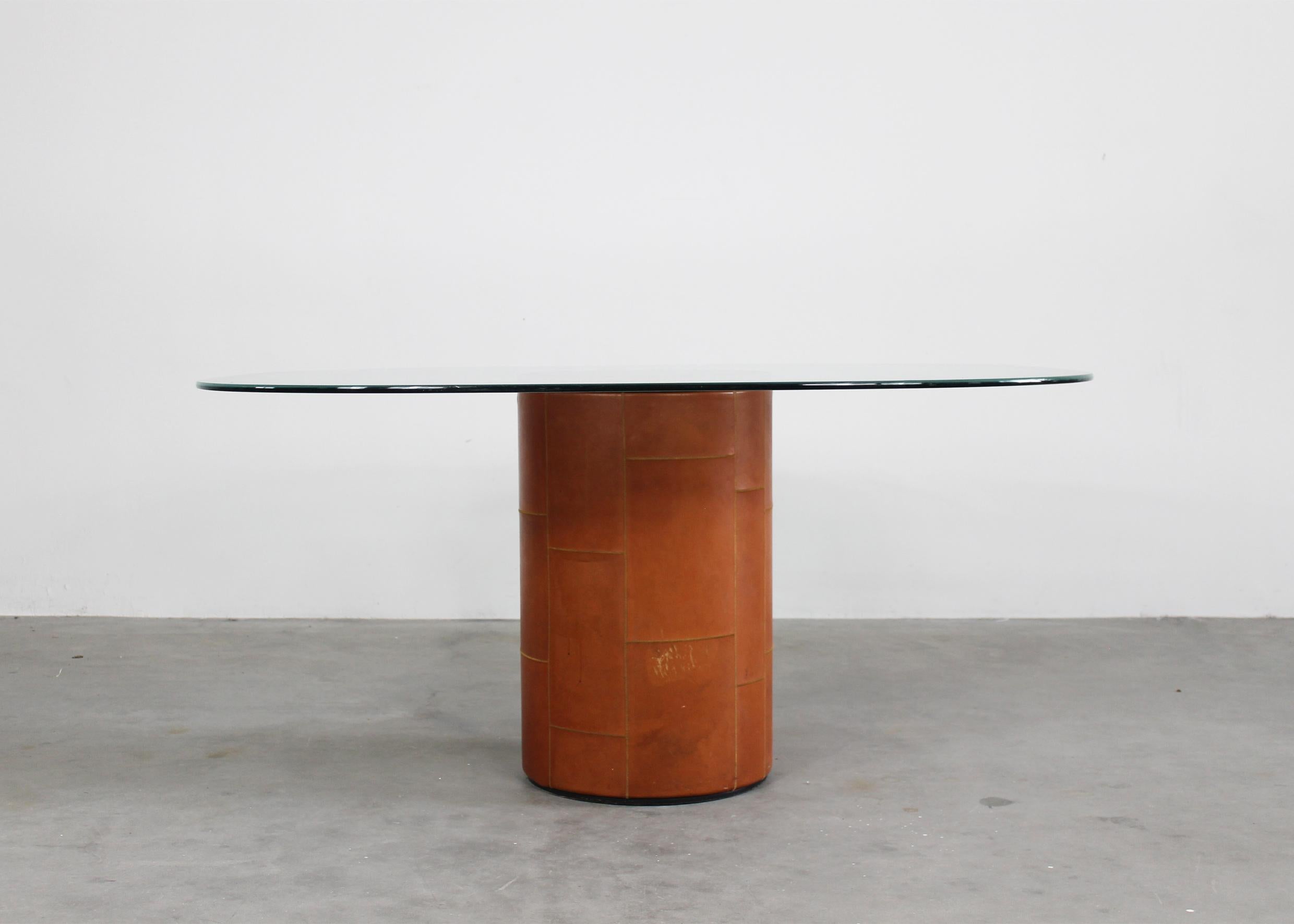 Tobio table with base in wood covered with leather and table top in ground crystal with a decorative sandblasted frame. 
Designed by Tobia and Afra Scarpa and produced by B&B in the 1970s 

Tobia Scarpa and his wife Afra Bianchin began their long