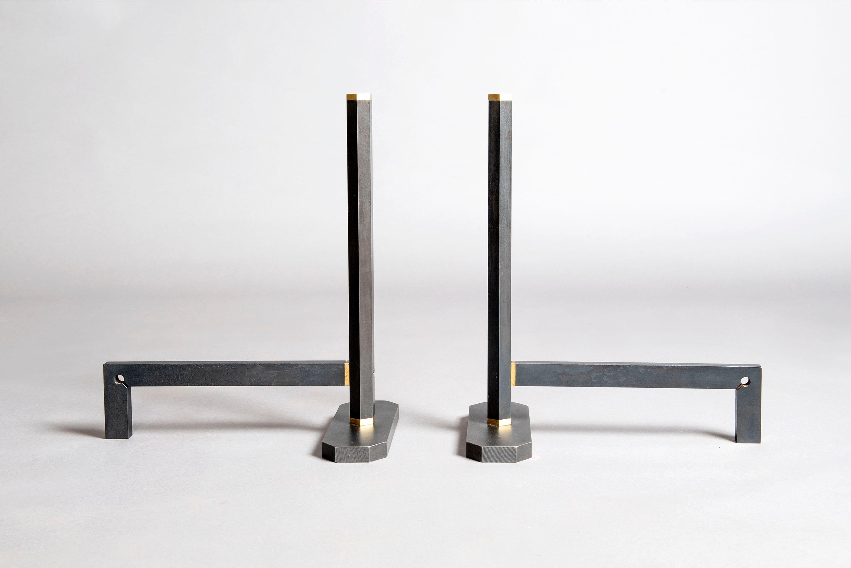 These beautifully restored andirons are in mint condition. The Scarpa touch mark is clearly visible. They are made of iron and brass. Ready for decorative or functional use.