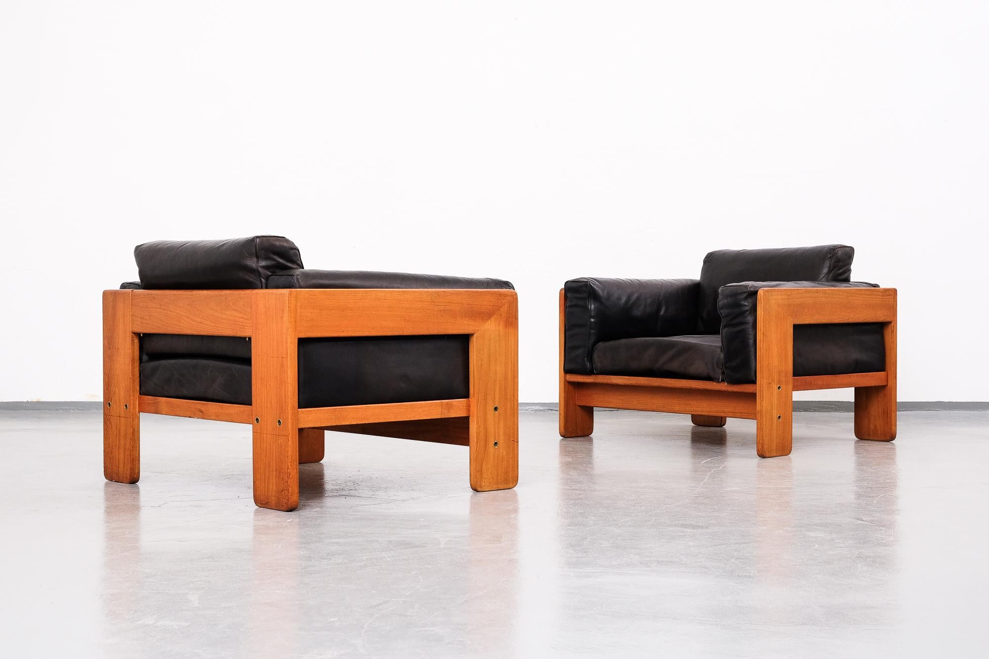 Lounge chairs model 'Bastiano' designed by Tobia Scarpa in 1960s. Teak frames and black leather. Produced by Haimi Oy in Finland.