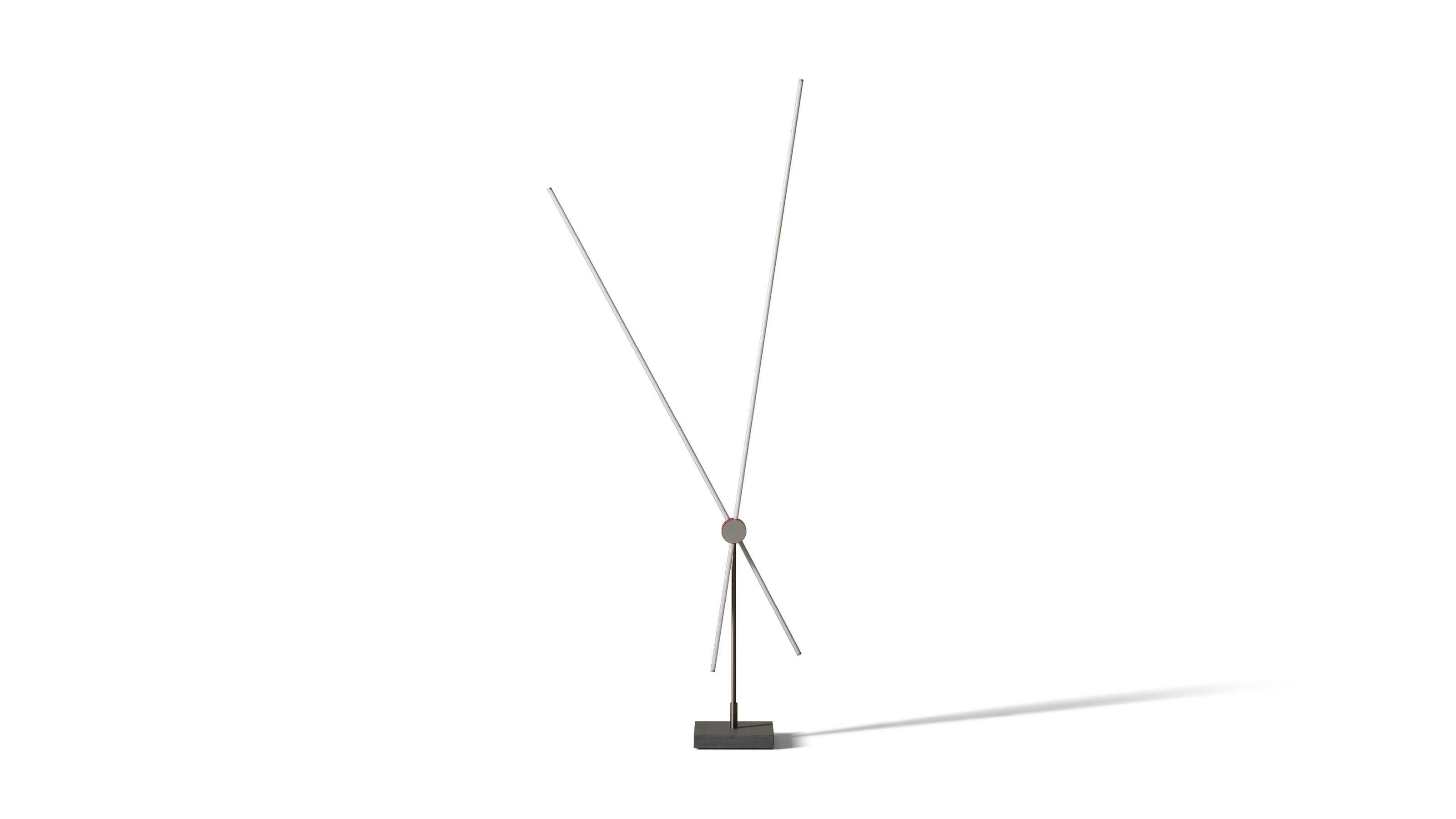 Tobia Scarpa Eitie Floor Lamp For Cassina

A floor lamp designed by Tobia Scarpa, that takes shape as a seemingly simple structure with sophisticated, innovative technology.

The lamp is composed of two luminous lines that can be joined to form