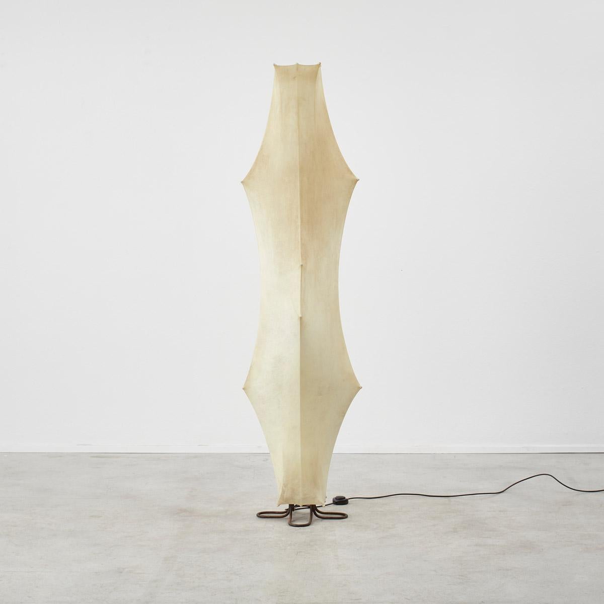 Fantasma, translates to ghost in Italian, reflecting the almost evanescent presence of the lamp. Created using cocoon resin on a metal internal structure, the shade emits a warm glow. The Fantasma Piccolo floor lamp is the first design of Tobia