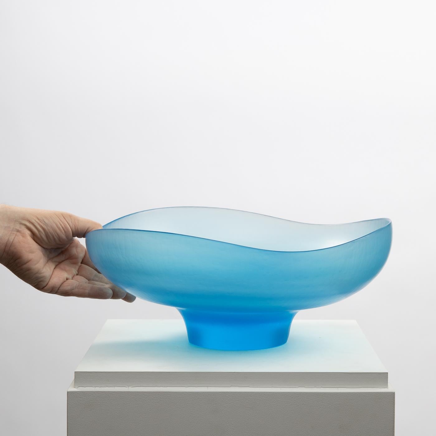 Bowl with a foot in light blue Murano mouth blown glass, wheel engraved glass finished with grindstone. This piece is part of 