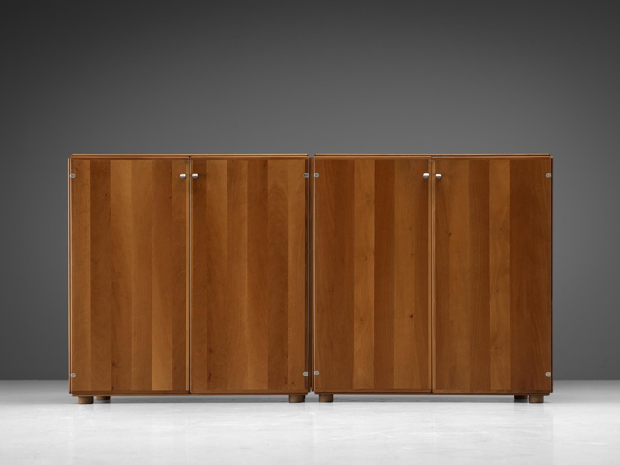 Tobia Scarpa, pair of cabinets in walnut, Italy, 1960s

This cabinet was designed by Tobia Scarpa, and shows a clear design that characterizes the work of Scarpa. 
The piece shows wonderful subtle details, such as the rounded door edges and