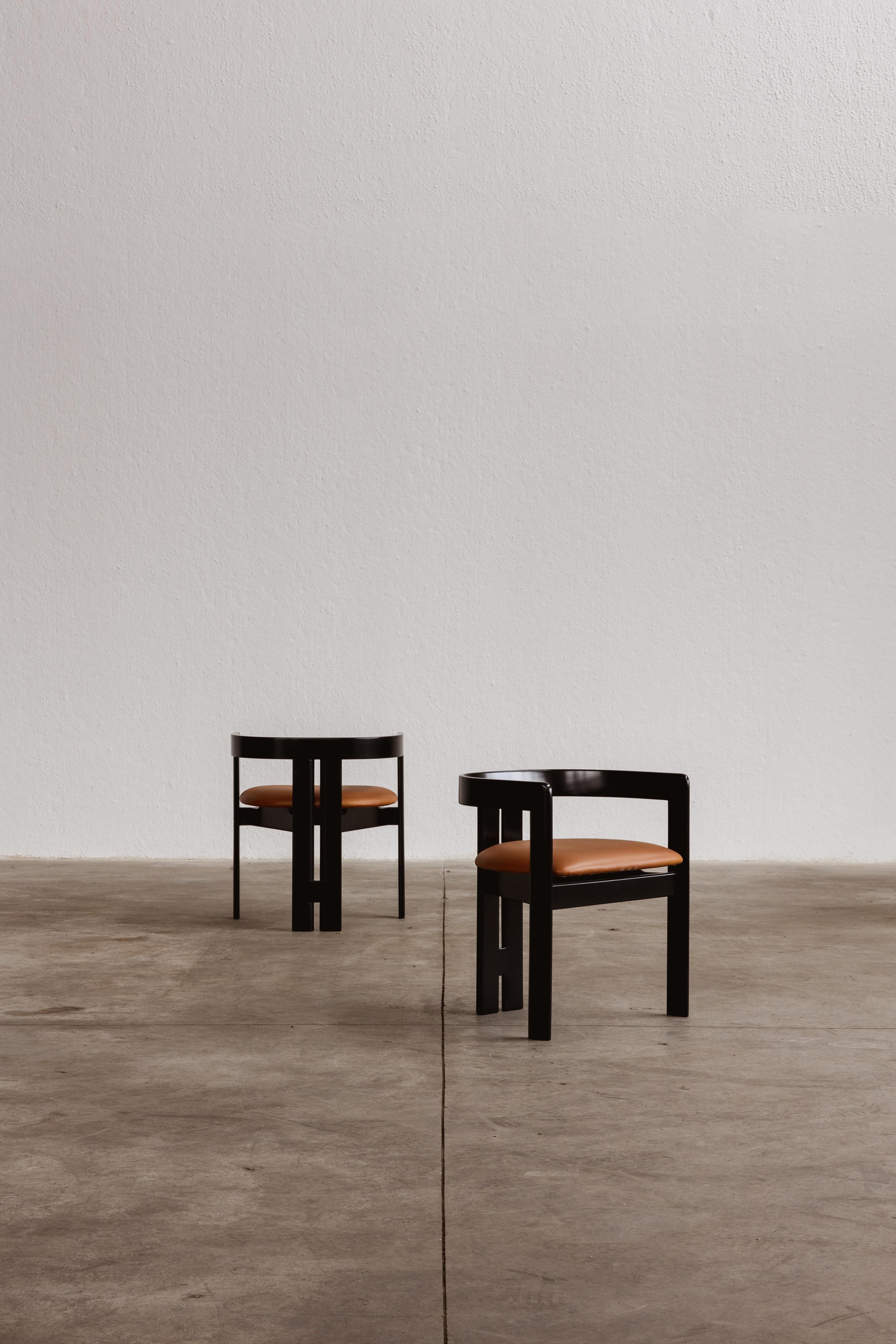 Tobia Scarpa 'Pigreco' Dining Chairs for Gavina, a set of six masterfully crafted pieces originating from Italy in 1960.

Originally designed for the furniture design course led by Franco Albini, the 'Pigreco' chair boasts an iconic design. Crafted