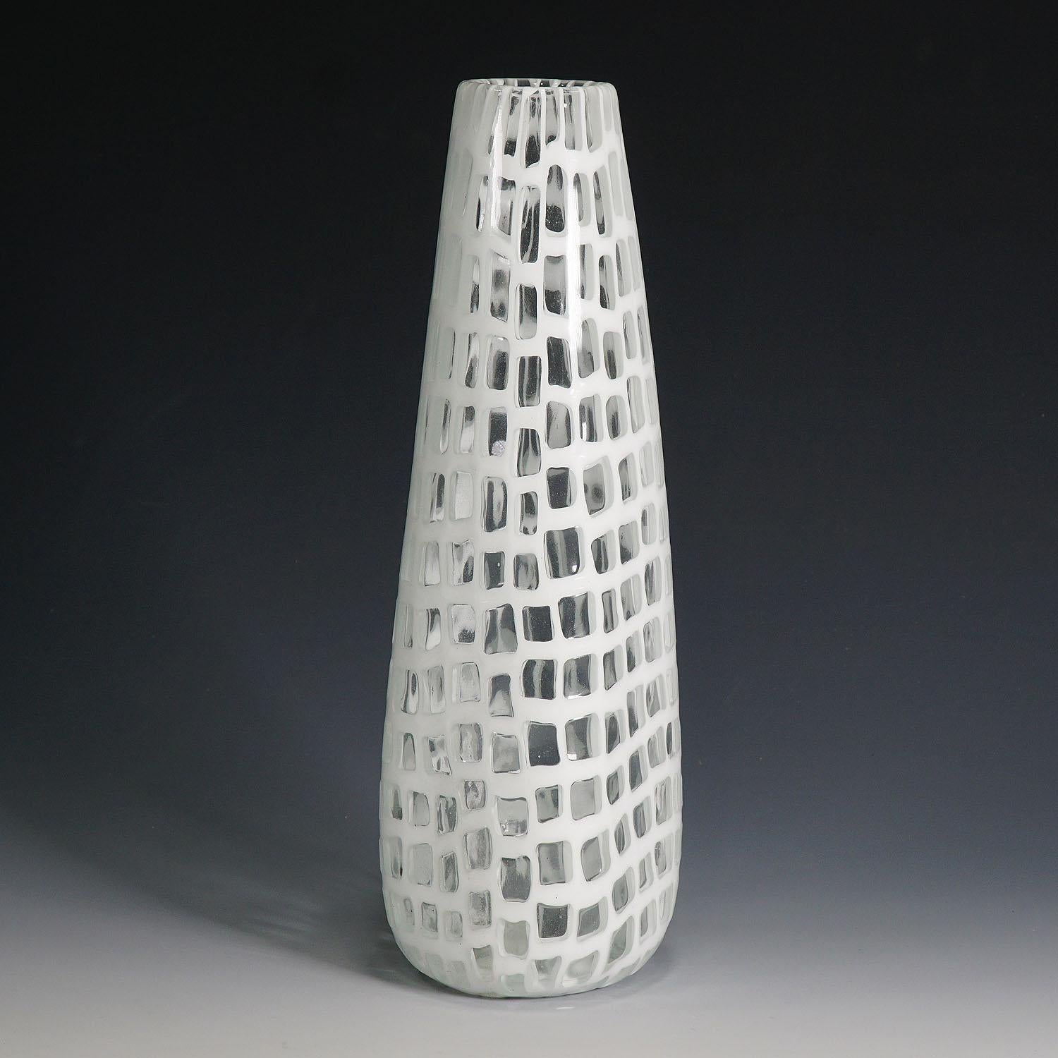 A white 'occhi' murrine vase designed by Tobia Scarpa in 1960, manufactured by Venini, Venice ca. 1970. Etched signature 'venini italia' on the base.

Measures:
Width: 3.94
