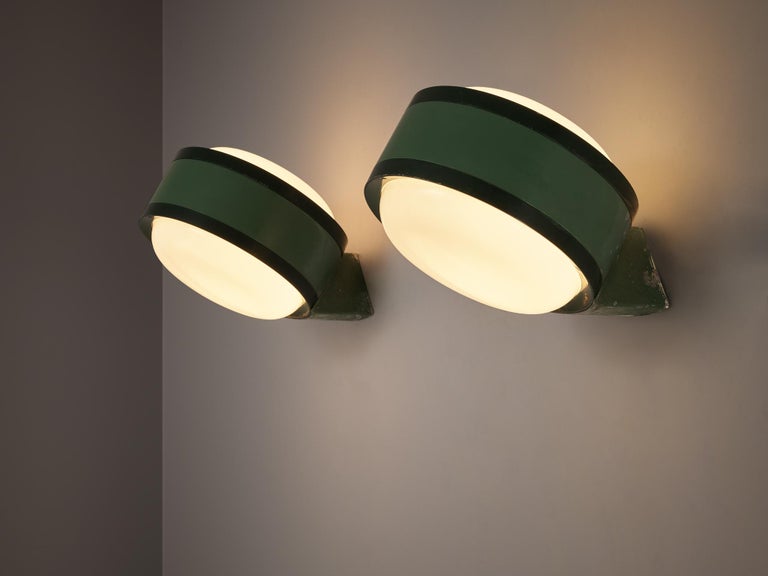Tobia Scarpa for FLOS, 'Tamburo' wall lamps, green colored aluminum, opaline glass, Italy, 1973

Originally designed as floor lamps for outdoors use, these ‘Tamburo’ lamp have been changed into wall lamps. Now their shape can be admired even more.