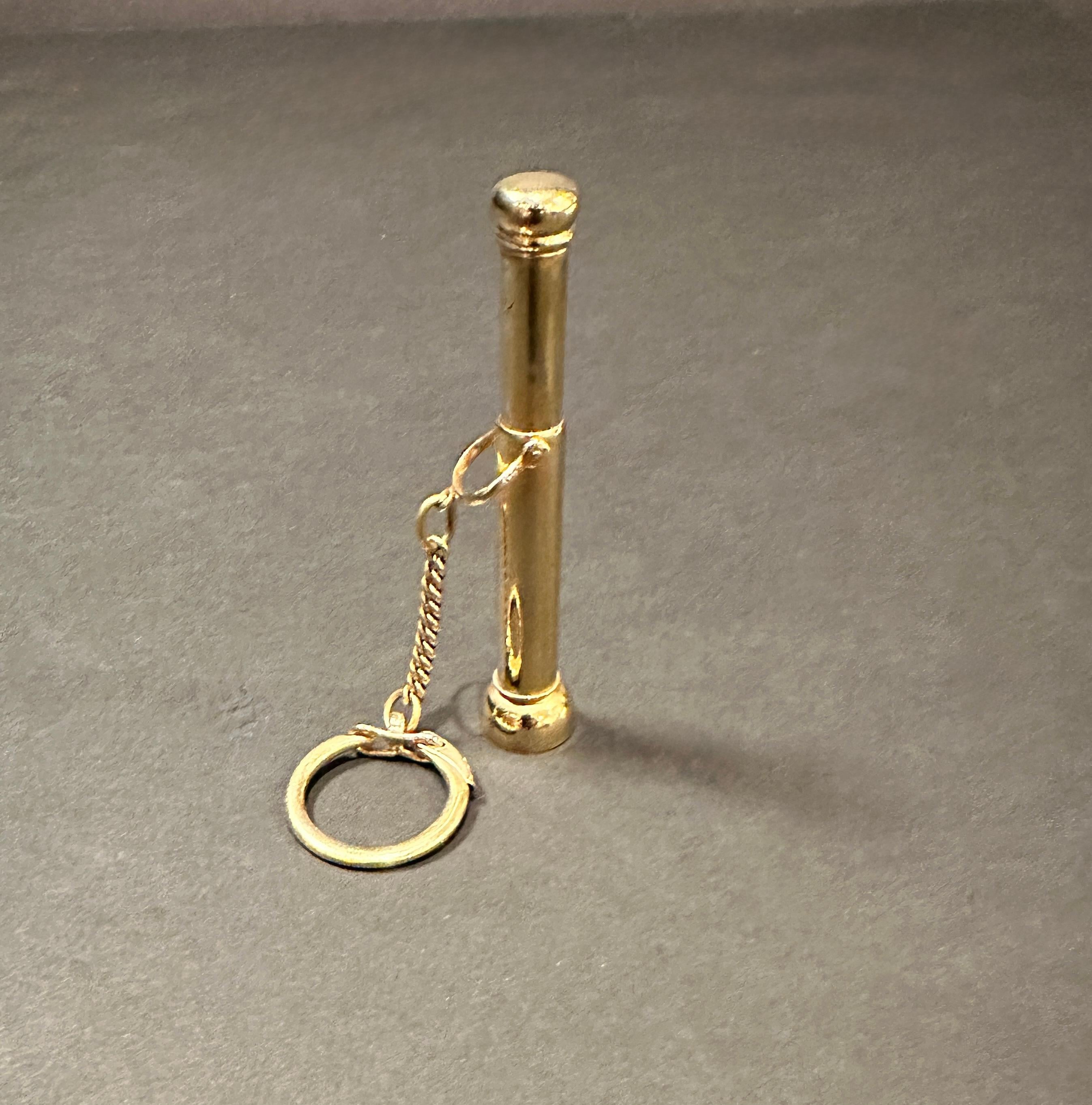 Antique 14K yellow gold pipe cigar punch accessory with chain and key ring attached. Stamped 