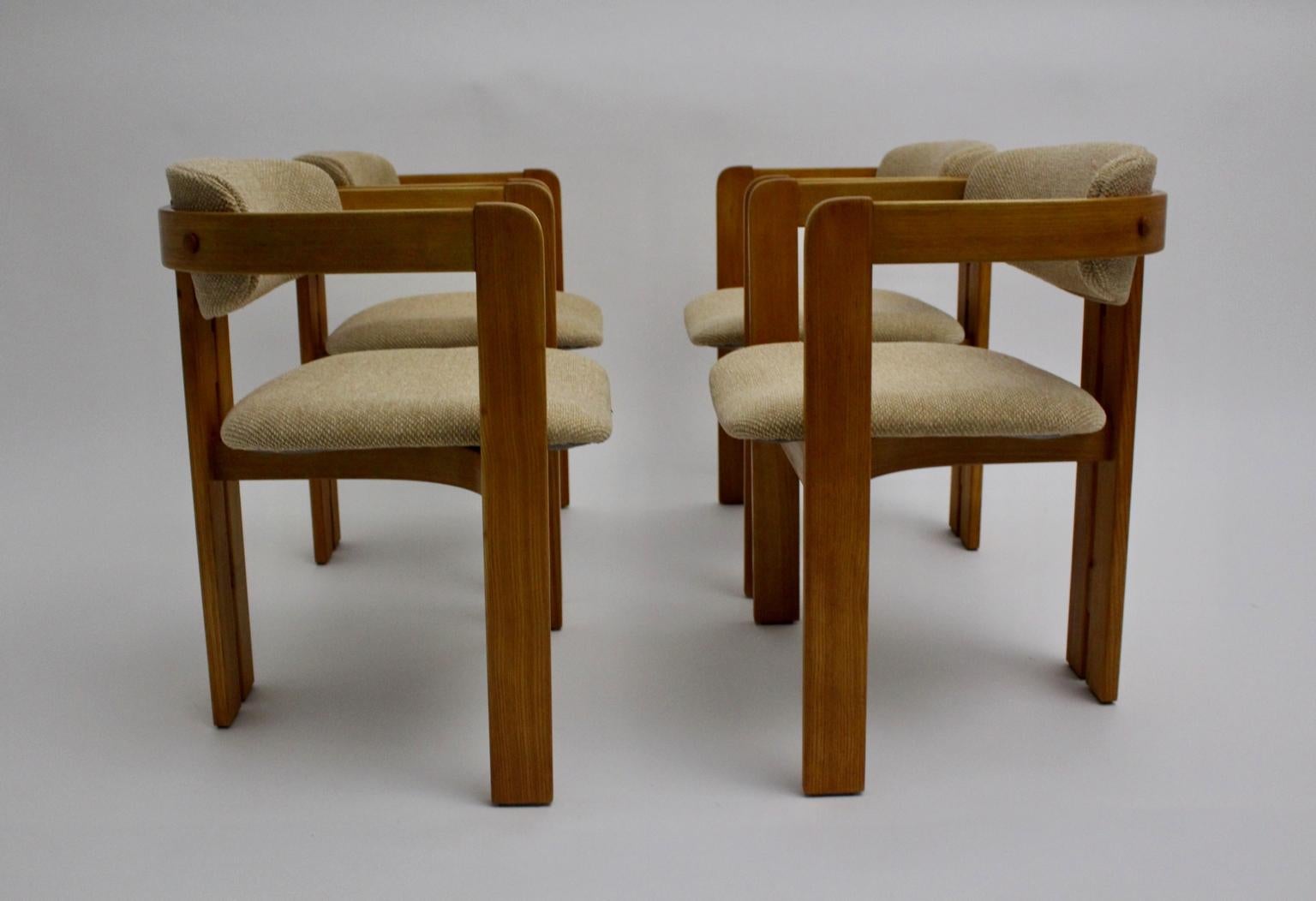 A vintage set four Italian vintage brown ash dining chairs, which was designed and executed 1970s.
The colorless lacquered wooden frame of the armchairs were made of ash wood and shows a beautiful warm brown tone, while seat and the back are