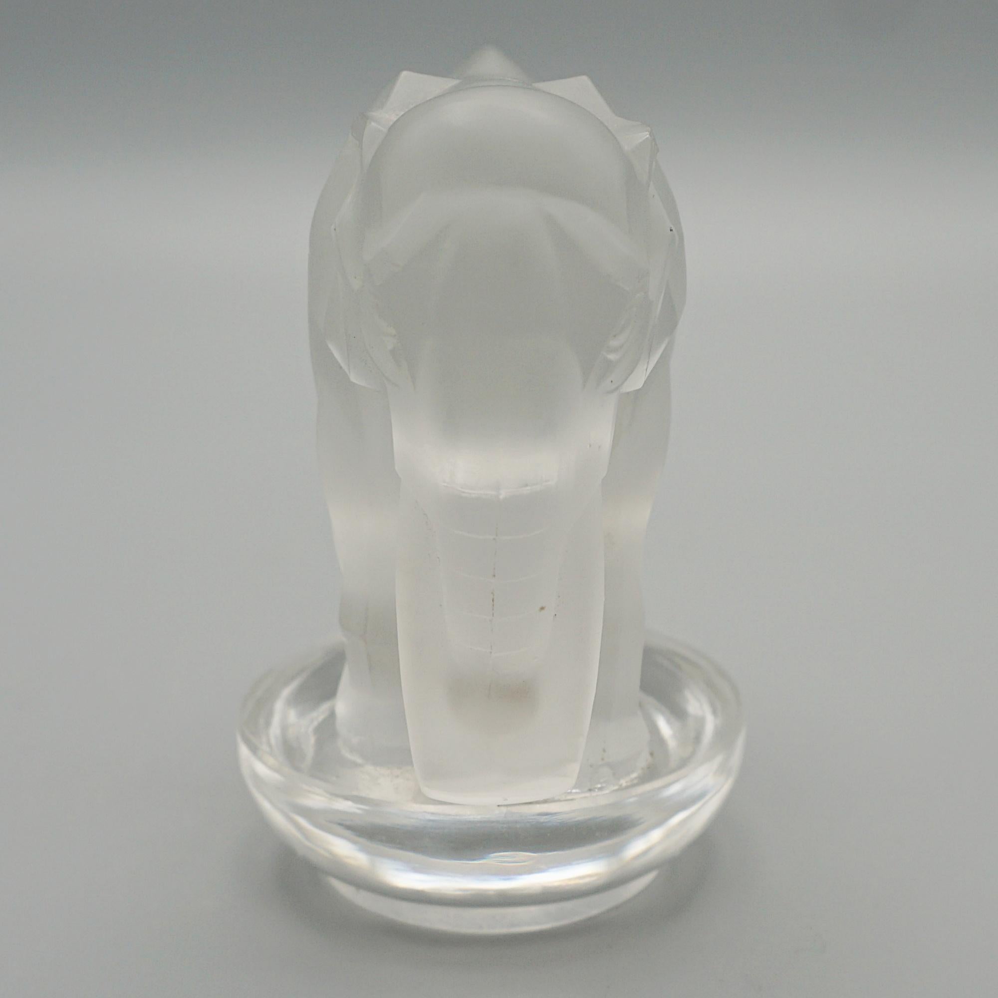 'Toby Elephant', a frosted glass paperweight by René Lalique (1860-1945). 'R. Lalique France' etched to base.

Dimensions: H 8.5cm W 8cm D 5cm

Origin: French

Date: 1931

Item Number: 1610241

René Jules Lalique (French, 1860–1945) was a renowned