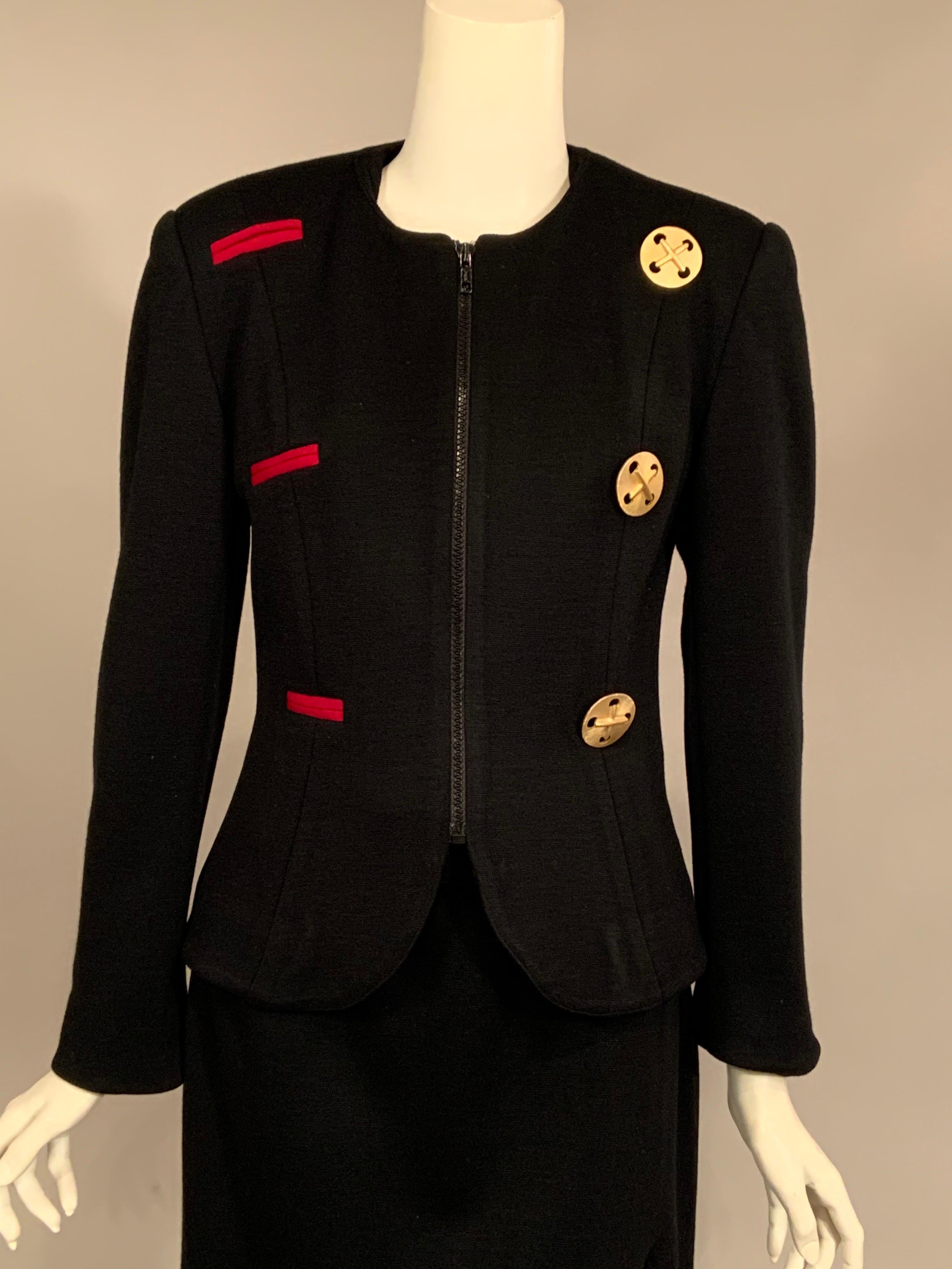 This is a fun little black skirt suit from Toby Lerner, one of the very exclusive ladies shops in Philadelphia.  The collarless jacket has a zipper at the center front, with three large decorative gold toned buttons on one side and three large red