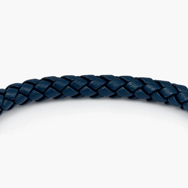 Click Tocco Bracelet in Grey Piped Italian Blue Leather with Black Rhodium Plated Sterling Silver, Size L

Accents of black can be seen on the edges of our blue Italian leather, highlighting each strand and showcasing our refined braiding technique.