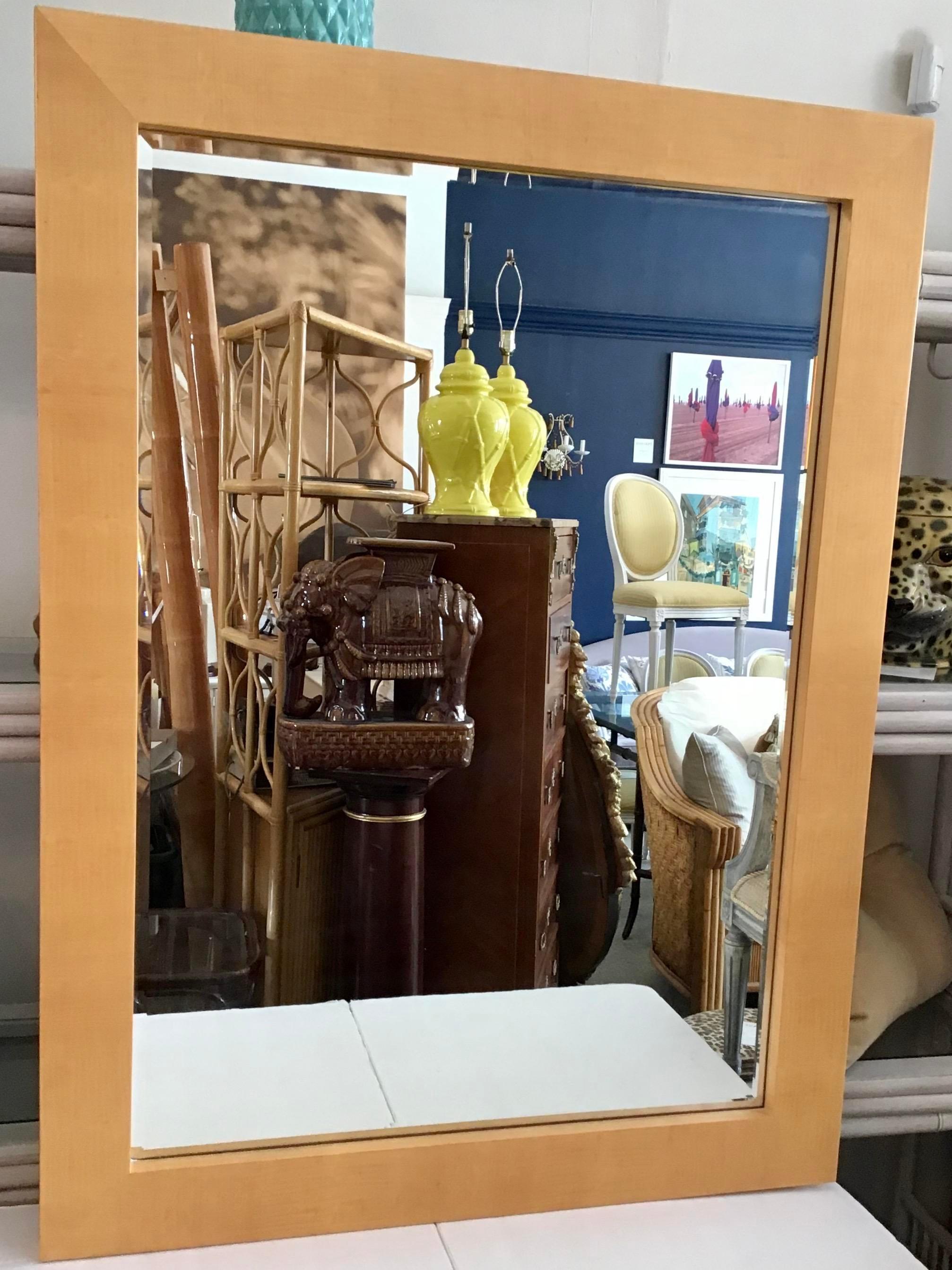 Classic Todd Hase Designed Anna Mirror with English Sycamore Marquetry. Very simple Modern Mirror with quality marquetry. This Mirror mount flush to our wall with a modern wall mount clip. Showroom Samples priced below standard showroom pricing. So