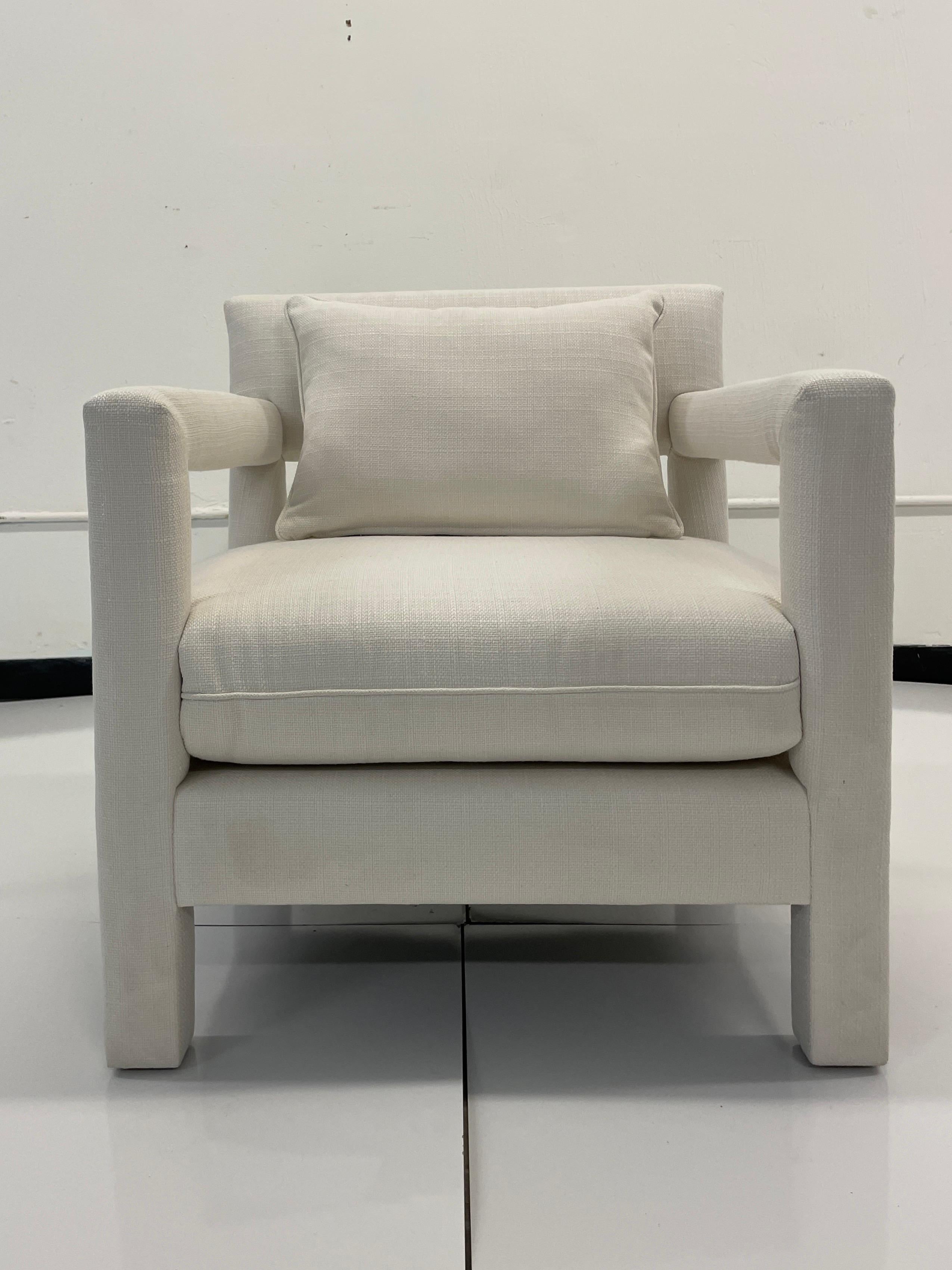 Classic Modern Details with fabulous tailoring designed by Todd Hase. Add some Modern Elements to your Living Space. This Classic Club Chair will work well with many styles of interiors and is upholstered in Todd Hase Textiles High Performance Off