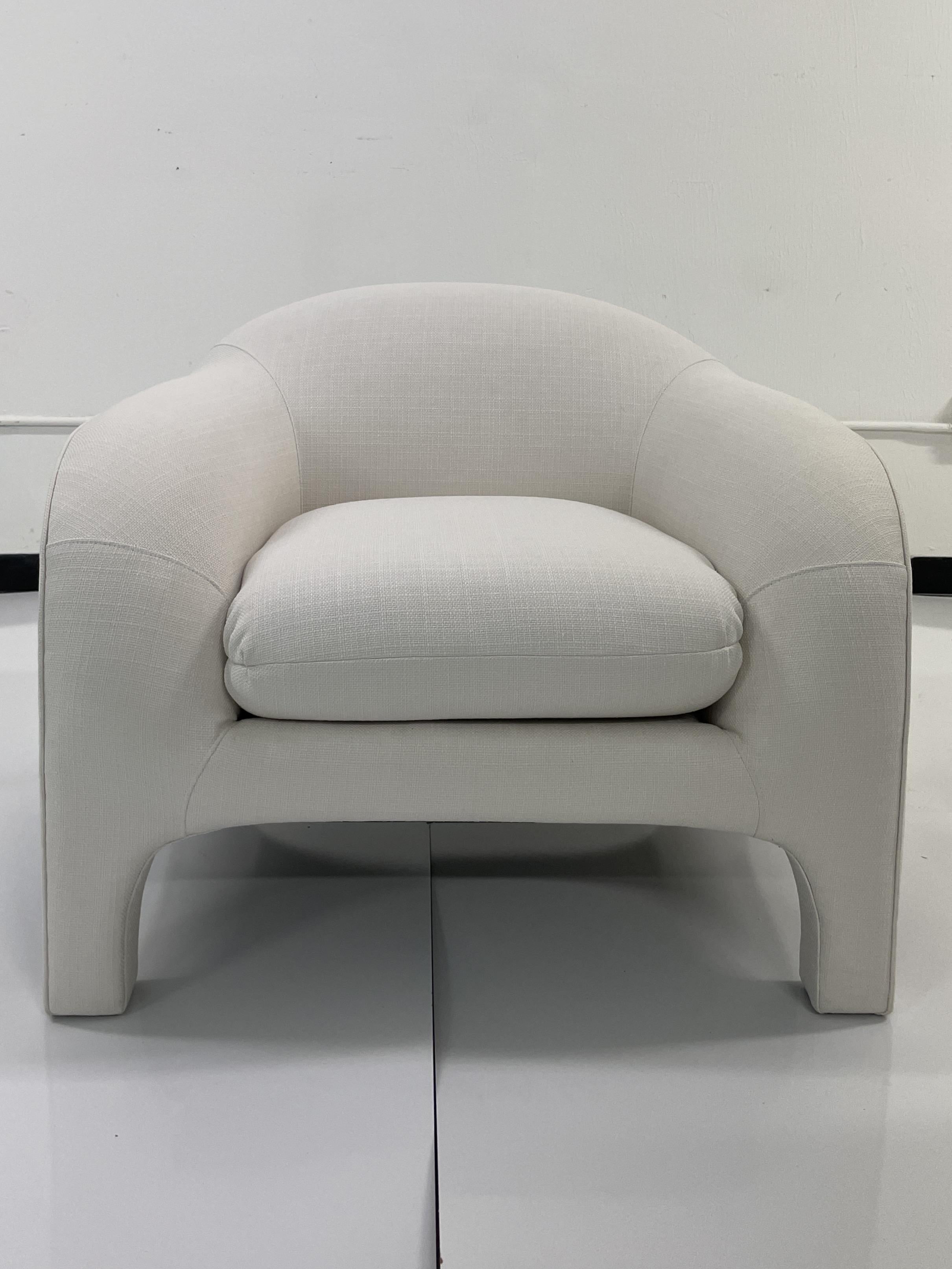 Classic modern details with fabulous curved shapes designed by Todd Hase. Add some modern elements to your living space. This classic sofa will work well with many styles of interiors and is upholstered in Todd Hase textiles high performance off