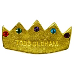 TODD OLDHAM signed vintage gold tone matte rhinestone crown pin