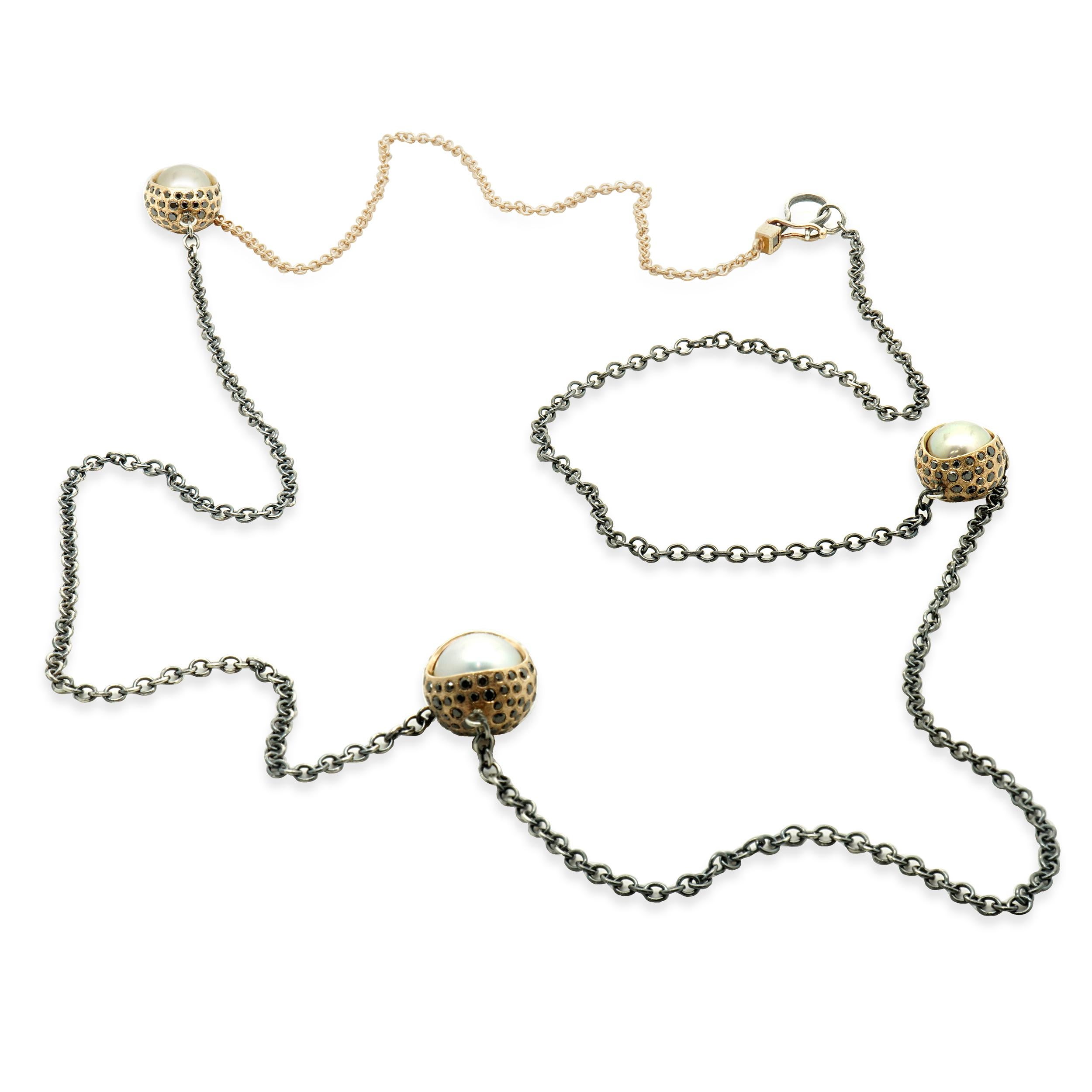 Designer: Todd Reed
Material: 18K yellow gold/sterling silver
Diamond: 285 round cut diamonds = 7.25cttw
Color: Black
Dimensions: necklace measures approximately 37.25-inches in length
Weight: 23.90 grams