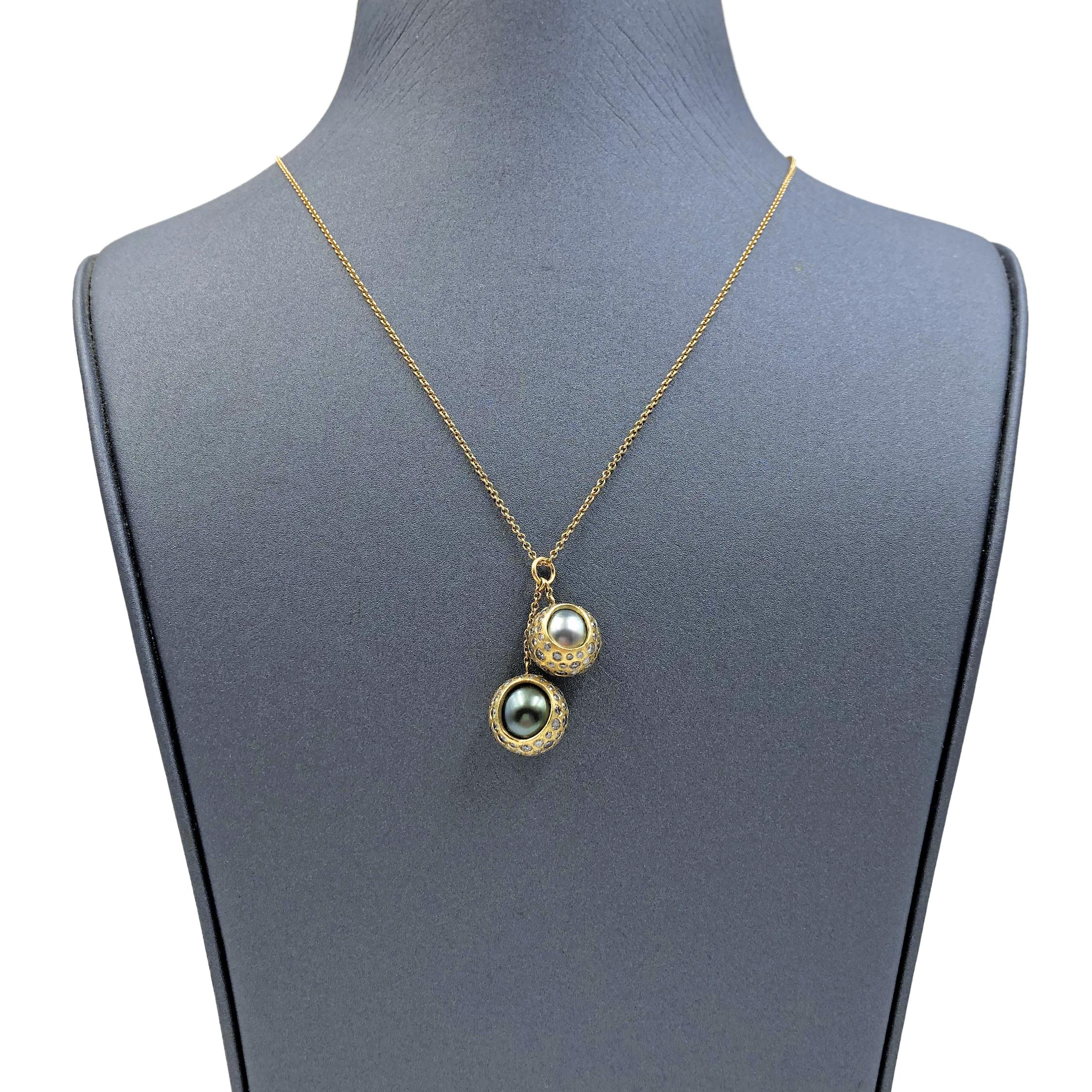 One of a Kind Tahitian Pearl Double Drop Necklace handmade by acclaimed jewelry artist Todd Reed in his signature-finished 18k yellow gold featuring two lustrous Tahitian pearls surrounded by 2.56 total carats of round brilliant-cut diamonds and