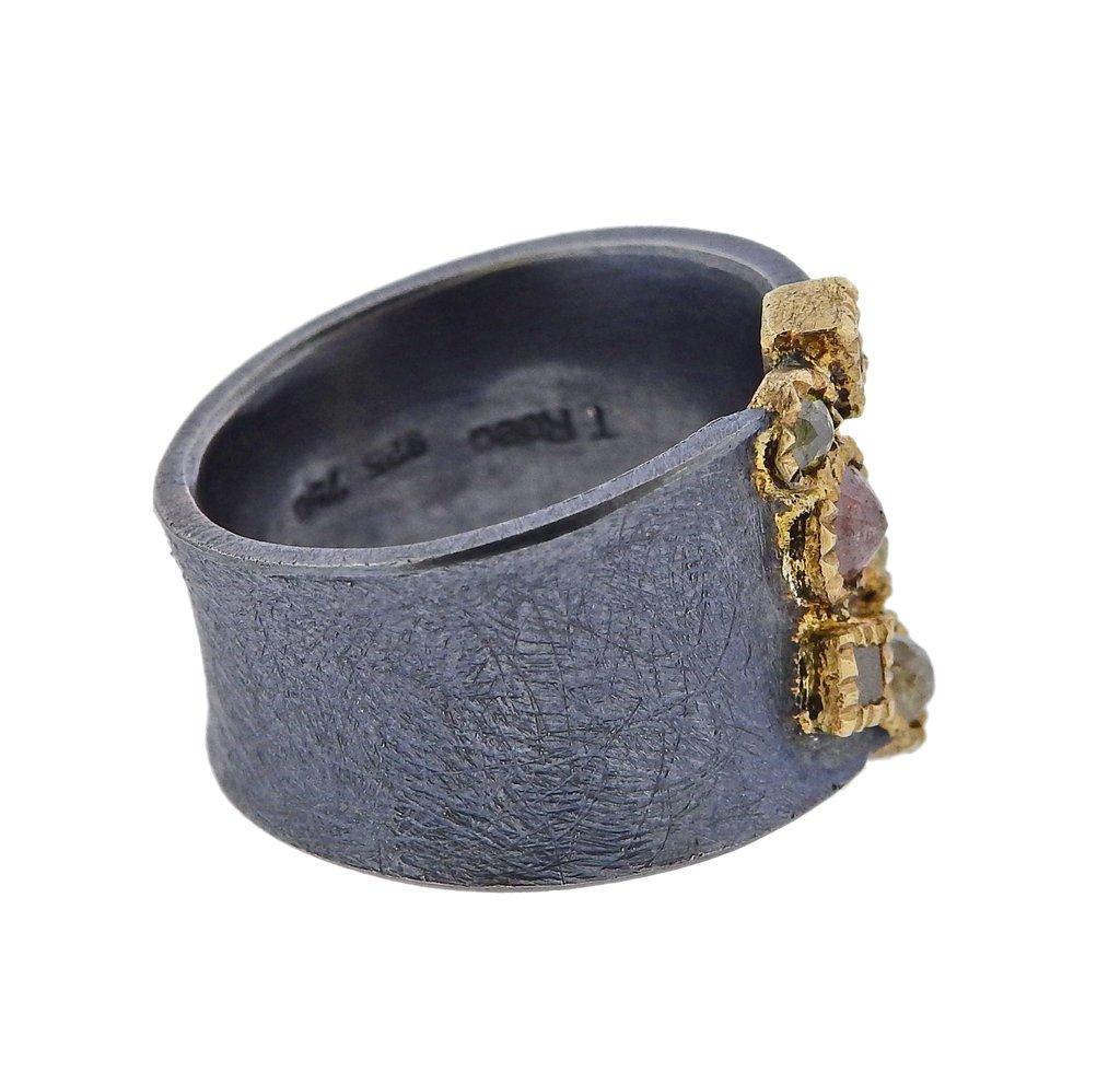 18k gold and oxidized silver ring by Todd Reed, set with approx. 1.00ctw in rough cut diamonds. Ring size - 6.5, top - 16mm wide. Weight is 11 grams. T.Reed ,750, 925. 