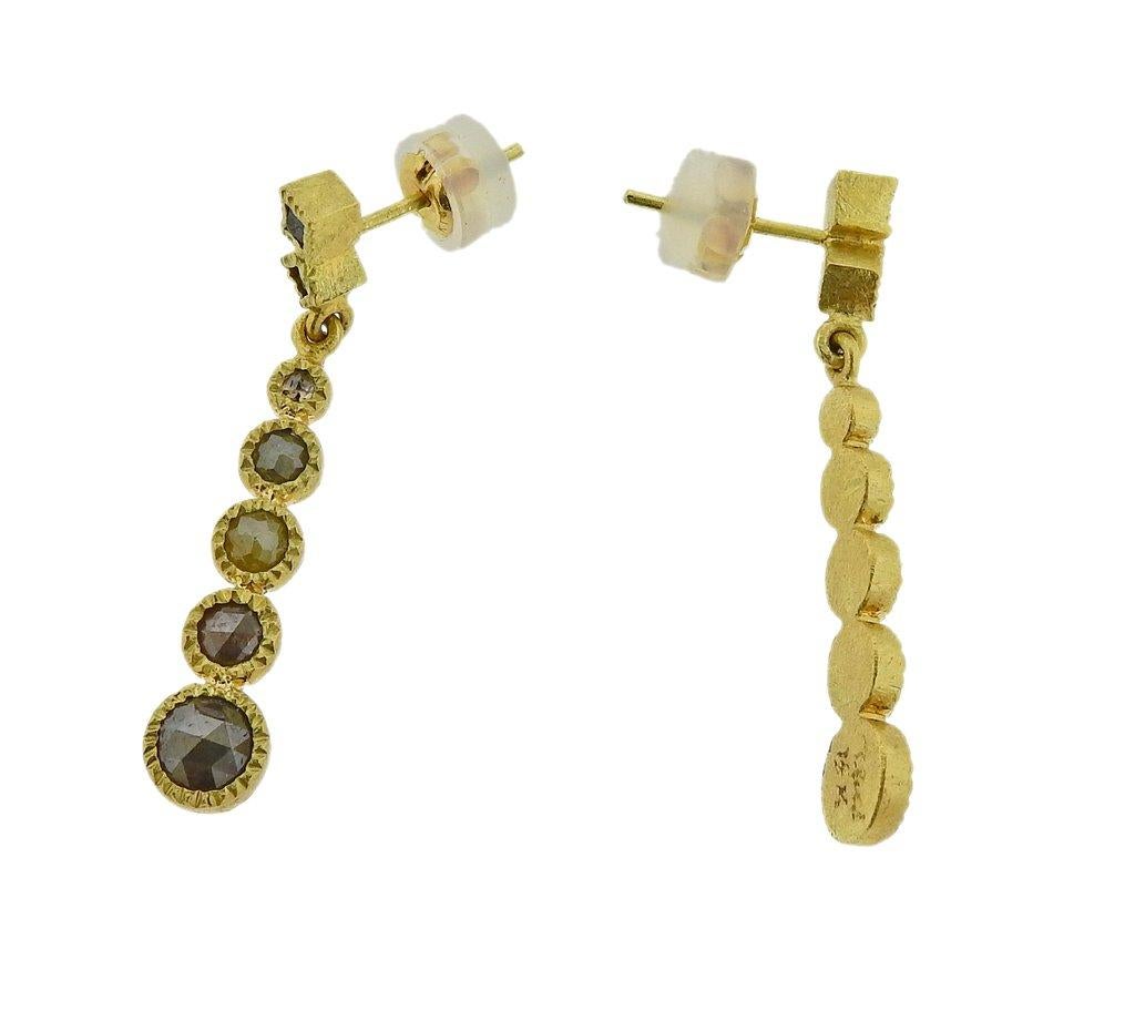 Pair of 18k yellow gold drop earrings by Todd Reed, set with approx. 2 carats in rough diamonds. Earrings are 35mm x 6mm and weigh 5.1 grams. Marked T.Reed signature, 18k.