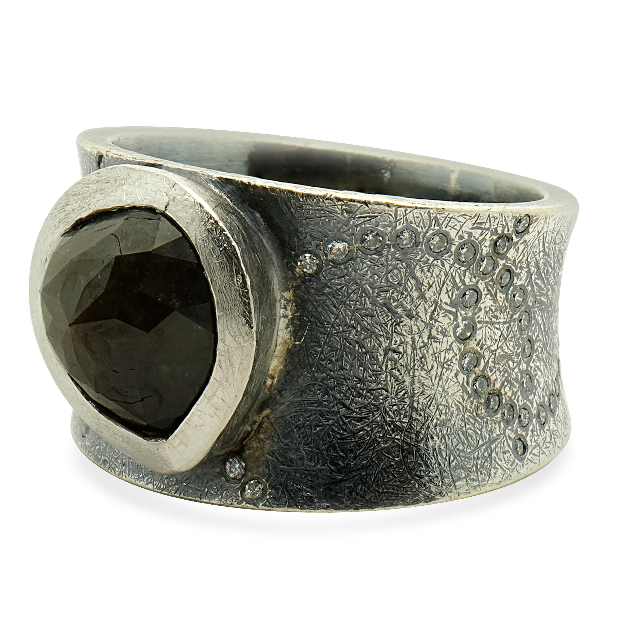 Designer: Todd Reed
Material: sterling silver & palladium
Diamond: 1 rose cut = 3.40cttw
Color: Brown
Clarity: I2
Diamonds: 61 round cut = 0.20cttw
Color: H
Clarity: SI2
Dimensions: ring top measures 14mm wide
Size: 6.5
Weight: 12.57 grams
