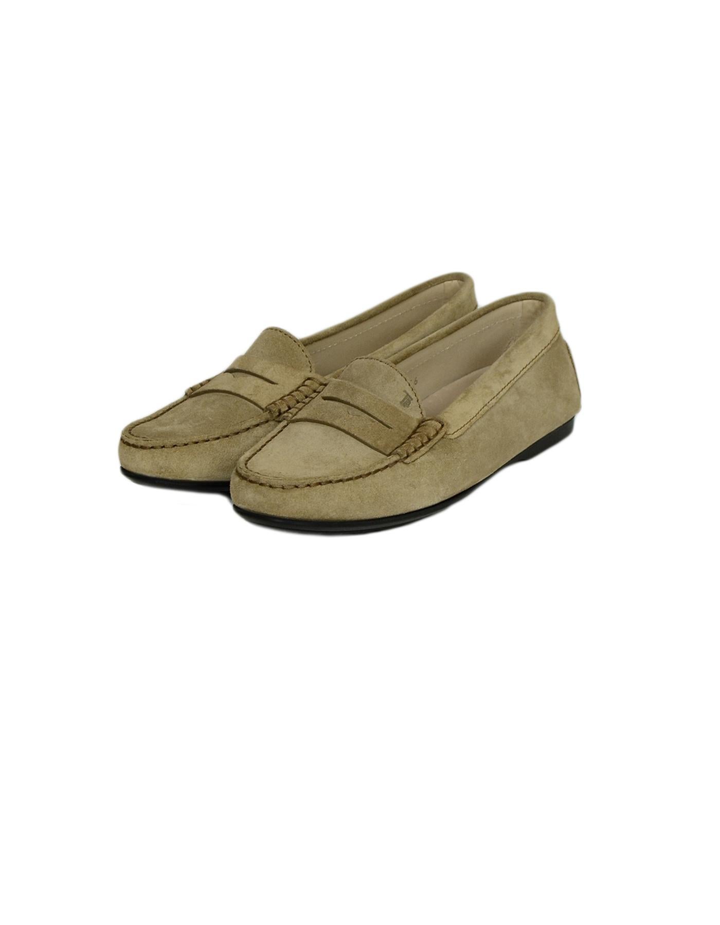 Tods Beige Suede Gommino Driving Loafers 

Made In: Italy
Color: Beige
Materials: Suede
Closure/Opening: Slip-on
Overall Condition: Excellent pre-owned condition, with the exception of color transfer on insoles 
Estimated Retail: $425 +
